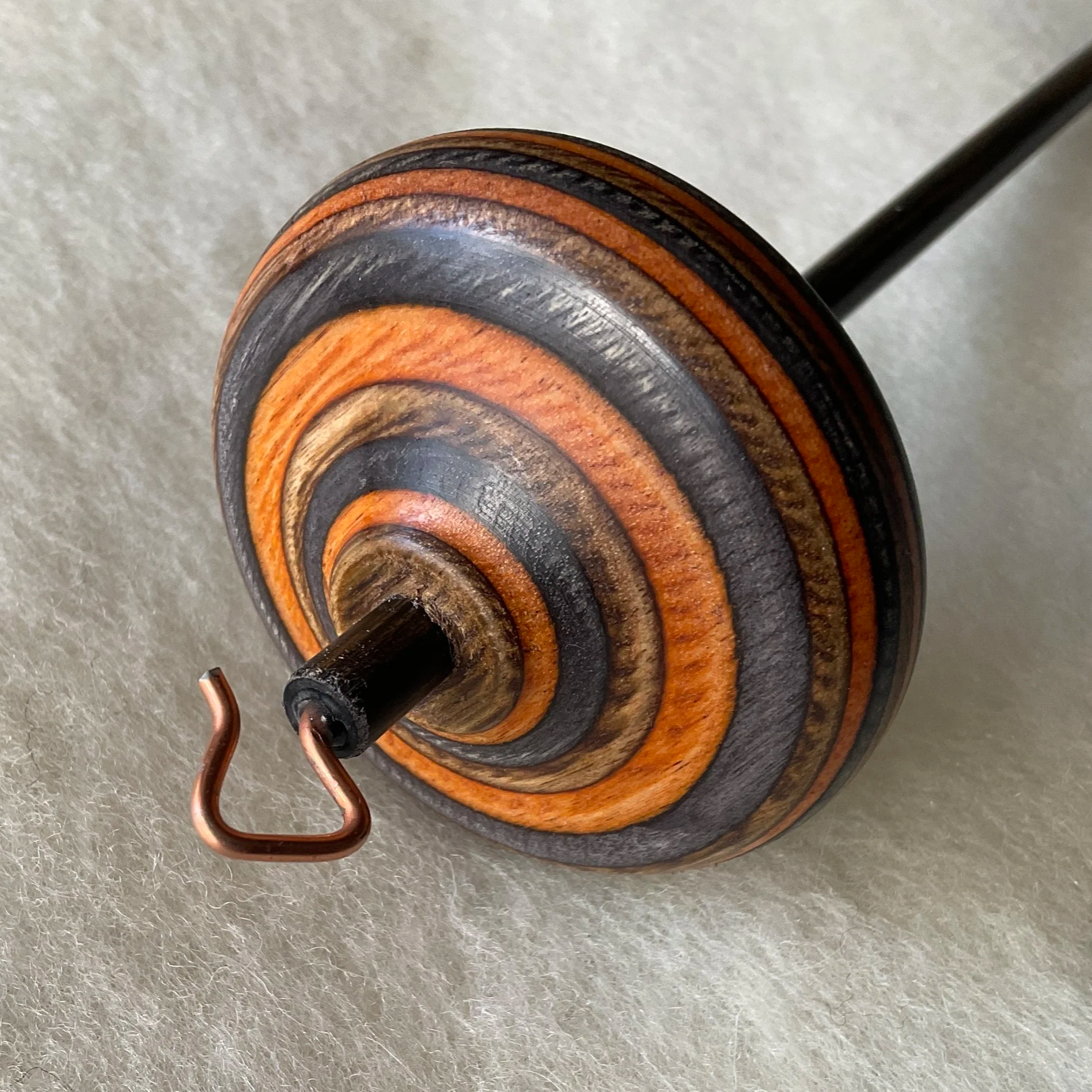 Sunflower whorl, charcoal shaft Mini Swan™ hand spindle