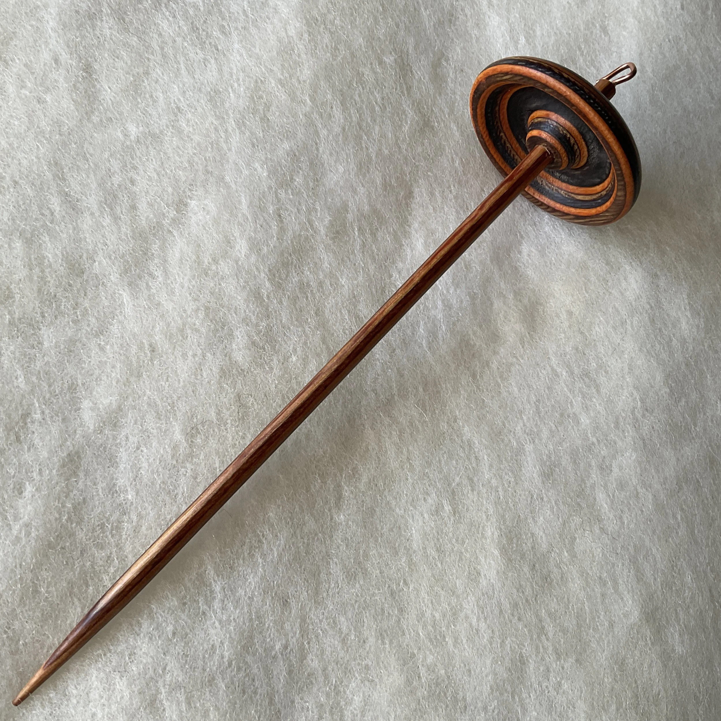 Cinnamon whorl, charcoal shaft Mini Swan™ hand spindle