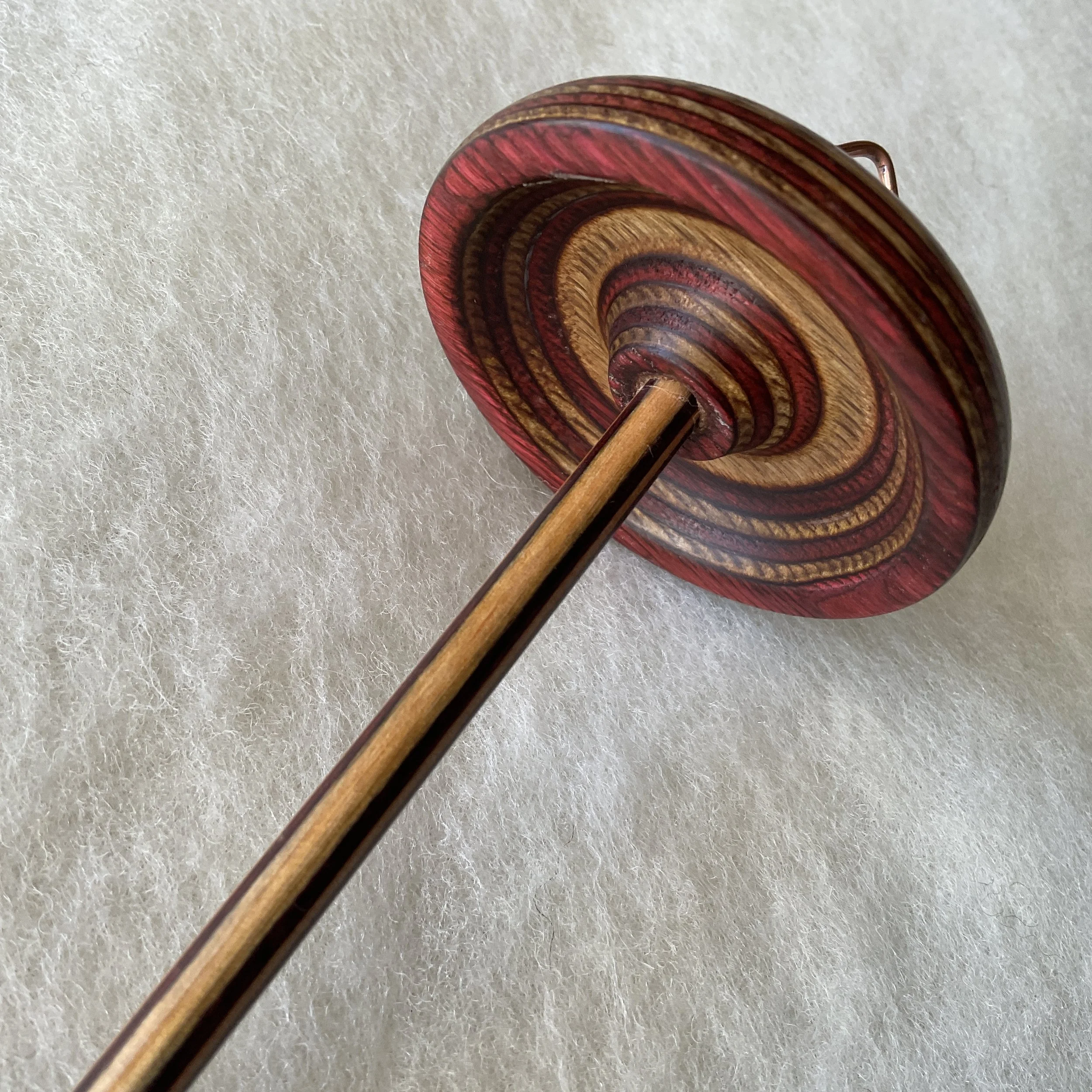 Cinnamon whorl, charcoal shaft Mini Swan™ hand spindle