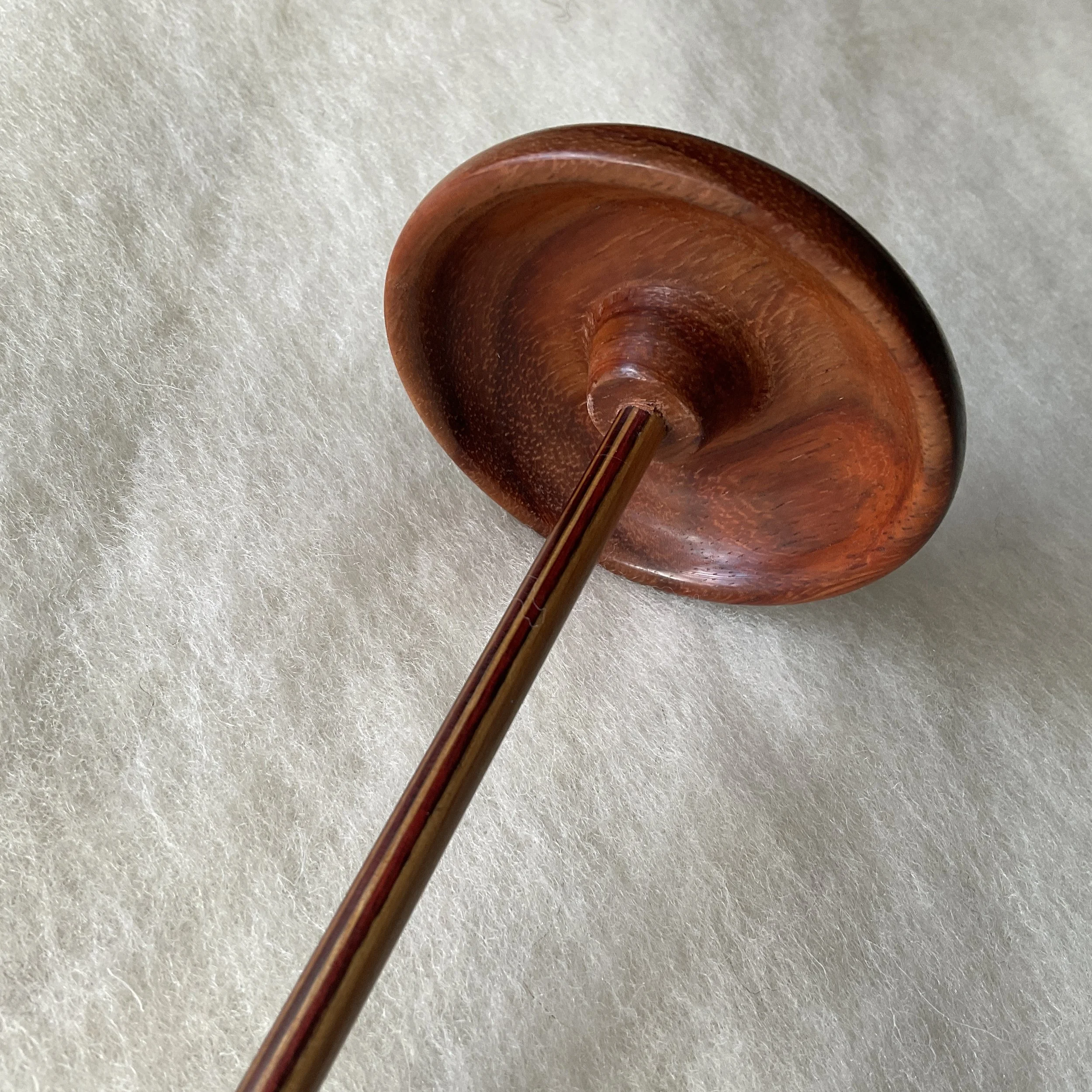 Swan™ Spindle in Padua with a Cinnamon Shaft - under whorl view