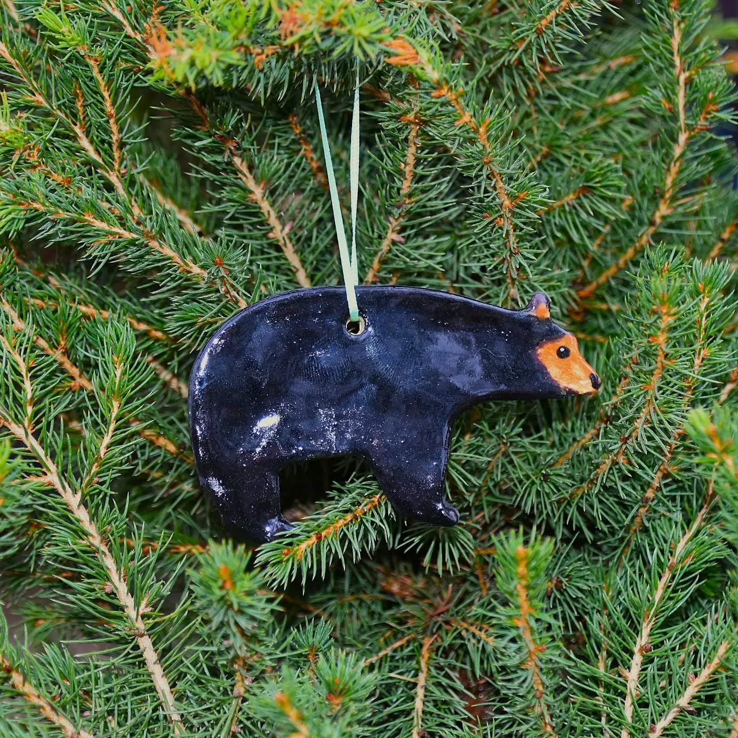 Did you know that Black Bears have the cutest, fluffiest butts? It's true, it's a fact. 
I am so happy with how my ceramic ornaments turned out. I'll have to make more animals next holiday season! 
...
If you are interested in celebrating black bears