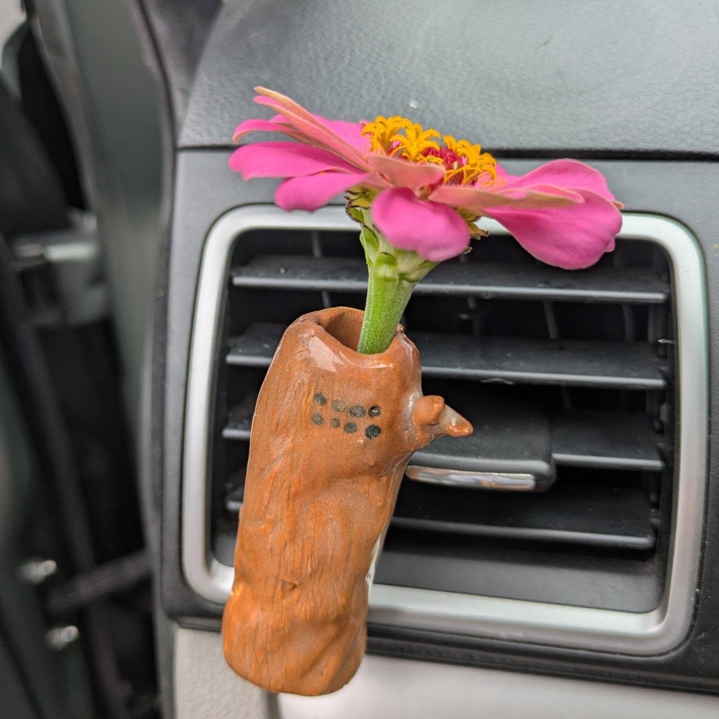 I made a little vase for my car so I can bring fresh flowers with me everywhere I go! 
...
Is it perfect - no. I put too much glaze on it and the vase wasn't completely carved out. But so what, it's for me! 
You should make and create as much as poss