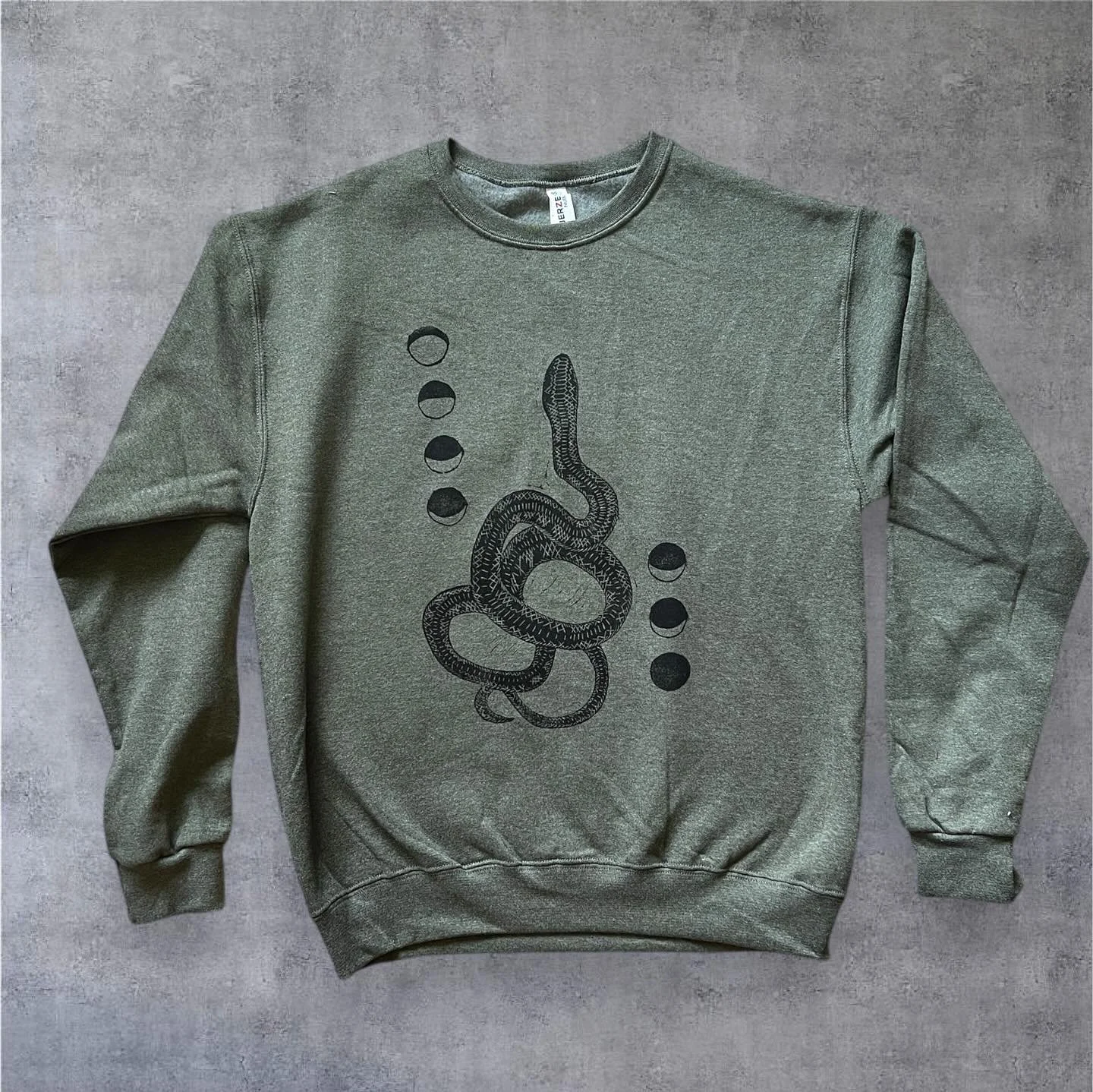 All of this clothing is on sale! Add on code SHIPFREE for free shipping as well! #sale #snake #owl #pika #fall #ghost #houseplants #linocut #natureinspired #sweatshirt #croptop