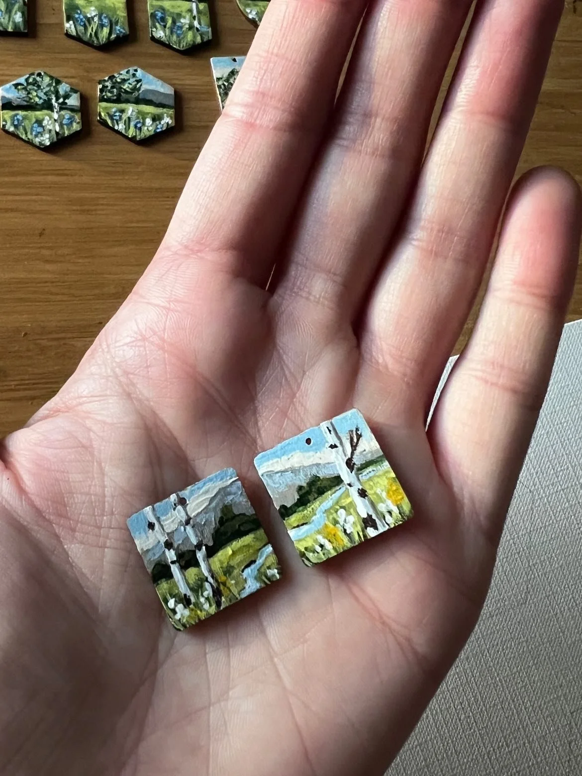 Surprise! I&rsquo;ve had such a great response to my new handpainted earrings that I&rsquo;ll be doing a drop of them early for you all! These one of a kind pieces will go live on Tuesday, May 26th at 9:00mst. 

#earringdrop #handpainted #landscapes 