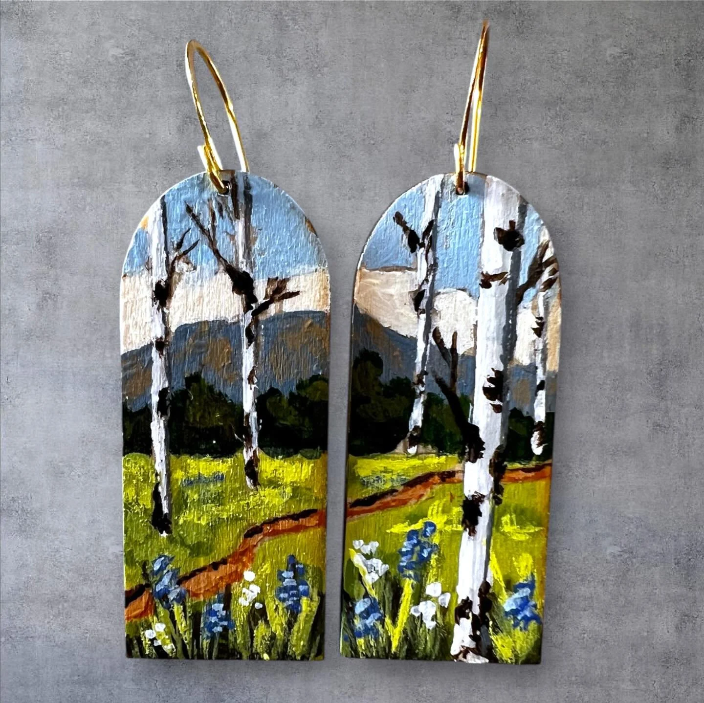 Art walk this Friday! I&rsquo;ll be at the gorgeous new @mokabzn with my handpainted earrings and maybe you&rsquo;ll even catch me creating some new ones! Come say hi:) 
@downtownbozeman 
#artwalk #bozeman #Montana #handpainted #earrings