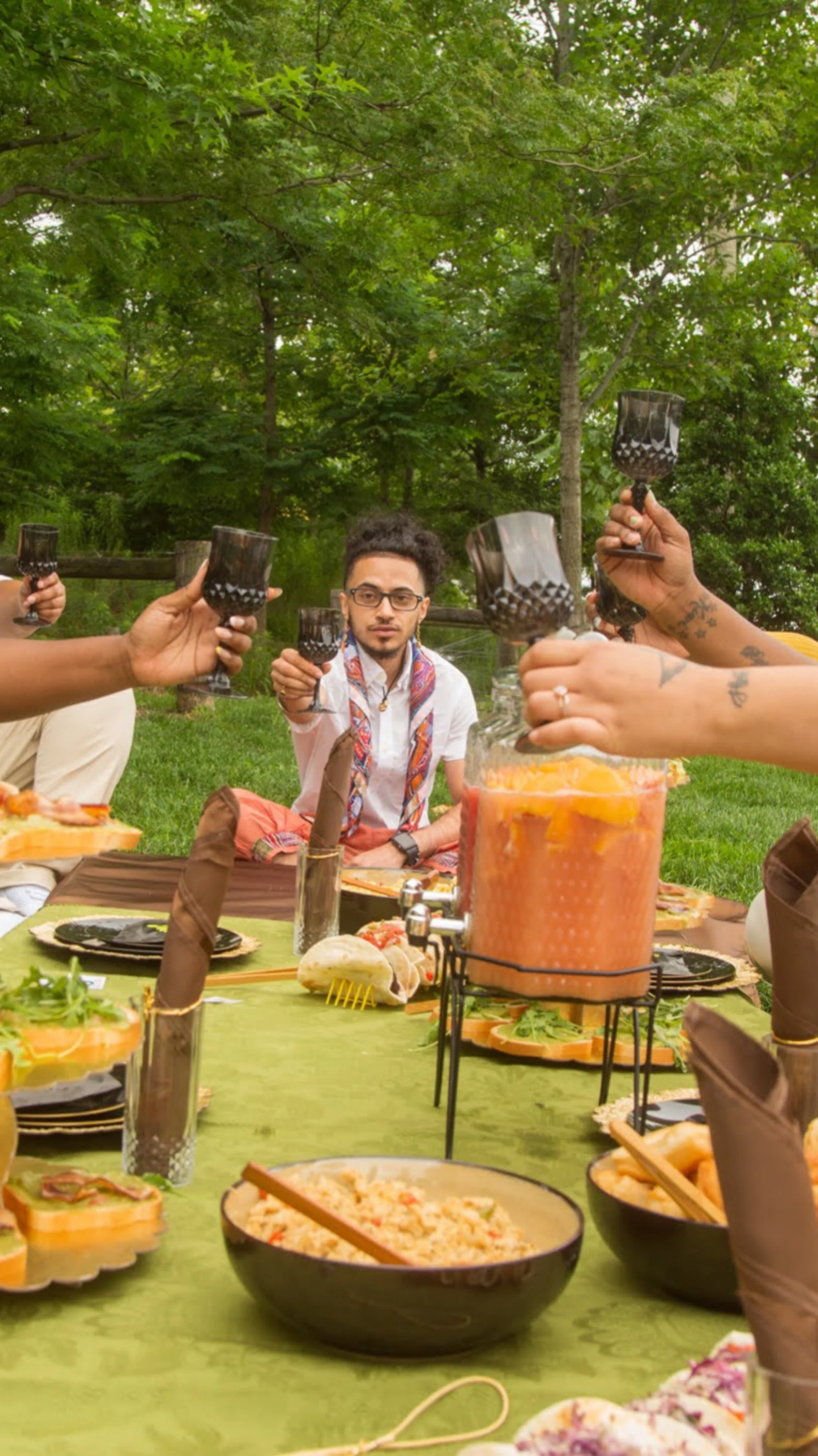 Models share a toast