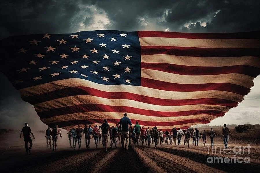 People walking towards a large American flag floating in the sky over a field.