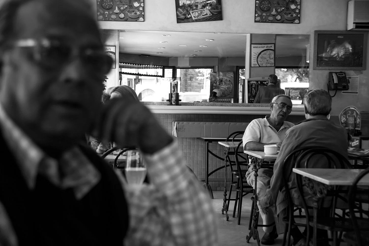 Conversation flows easily across the table in a neighborhood café.
Barcelona