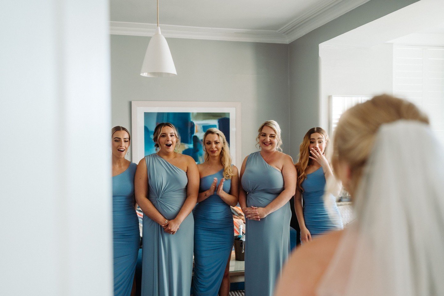 Who can resist the charm of a stunning bridal gown unveiling? 

After all the excitement and preparations leading up to the big day, organizing a moment to showcase the bride in her magnificent wedding attire is truly wonderful. Capturing the heartfe