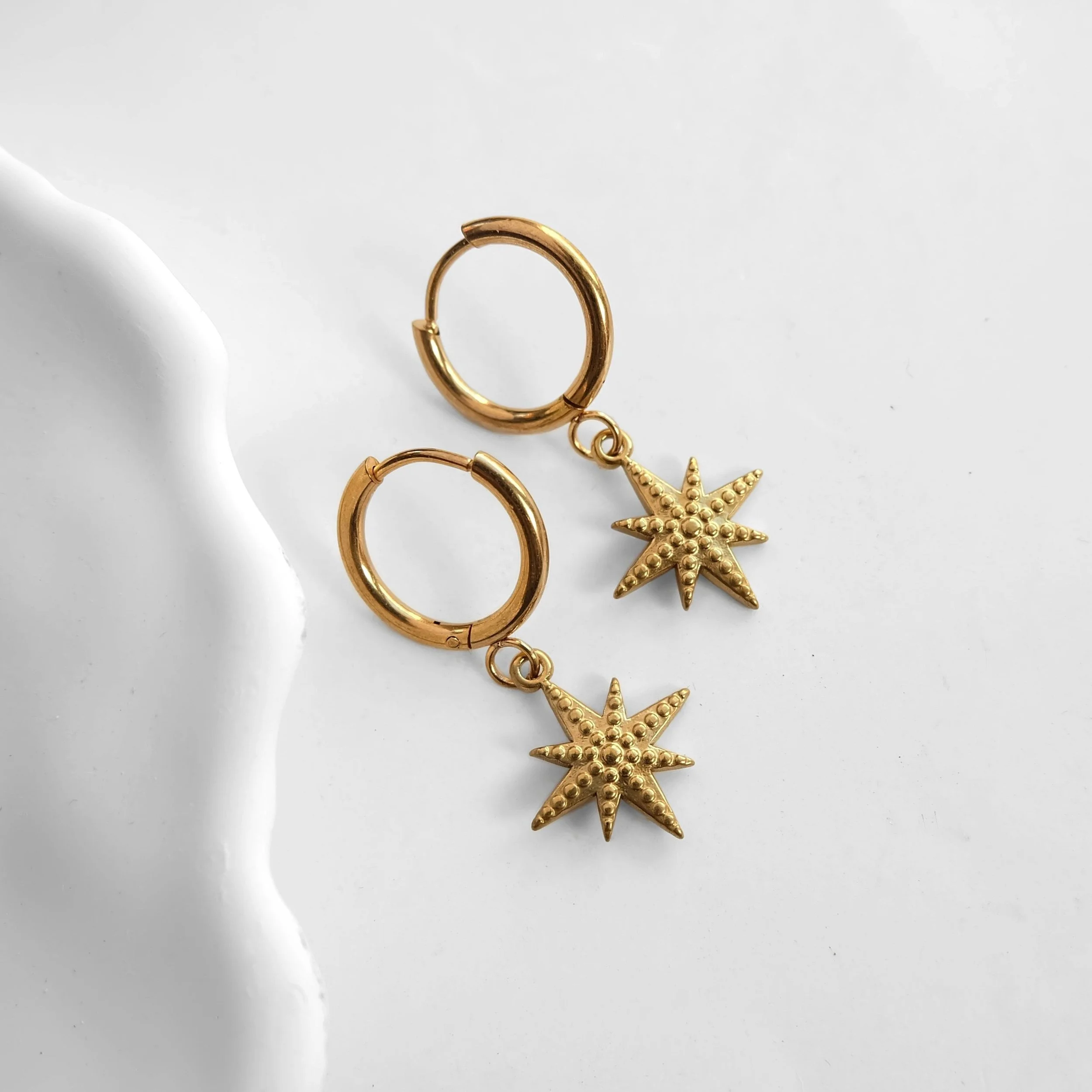 zorya-star-earrings-1.jpg