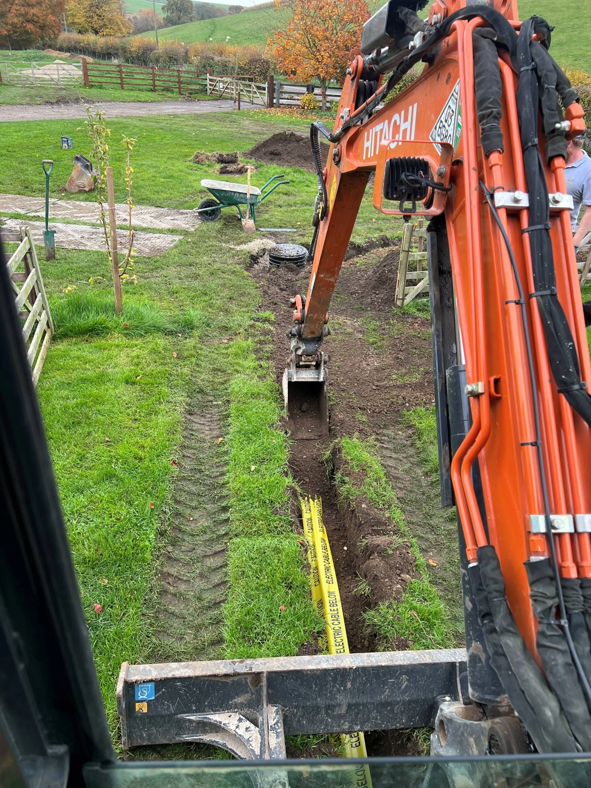 Electric cable with warning tape