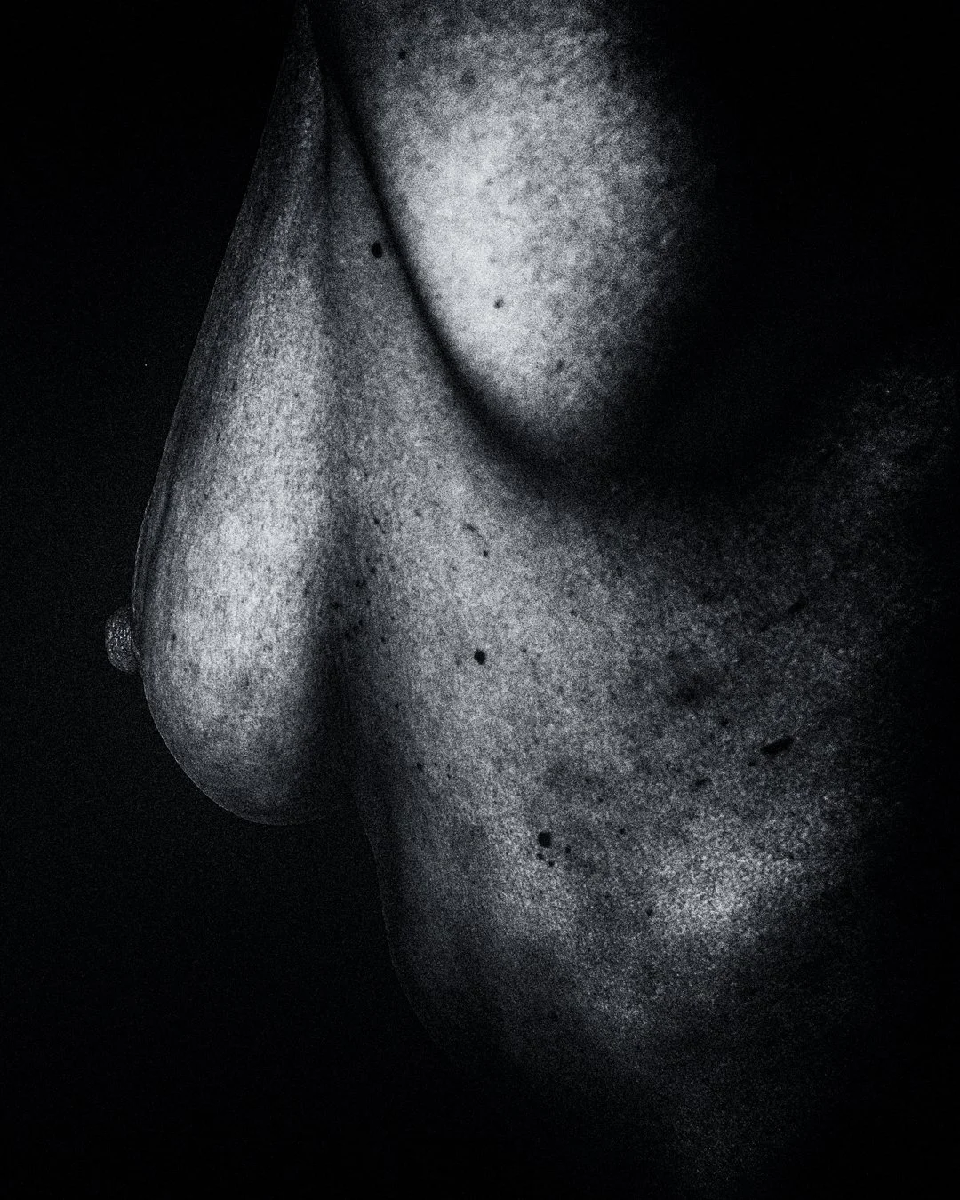 The Rock - Nude art black and white photo converted into abstract.