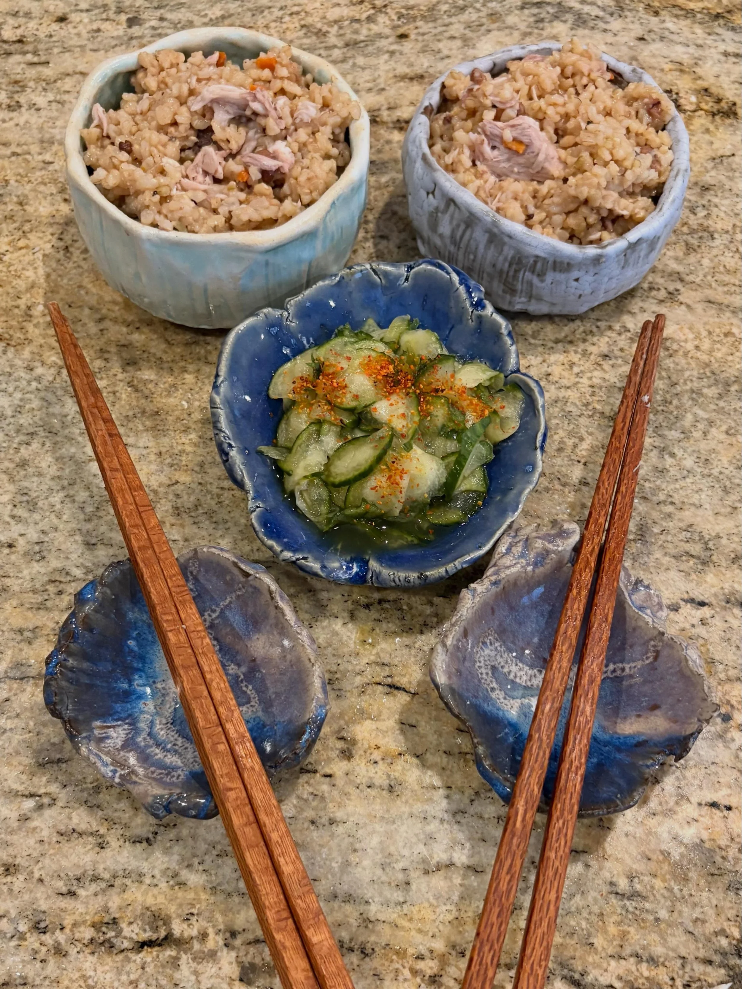 Octopus &amp; swordfish rice with red vinegar cucumber pickles. Food I made in pottery I made. Five years ago I wouldn't have believed it.

I'll likely be back at the NC State Farmers Market this Friday through Sunday, June 5-7, exact location TBA.

