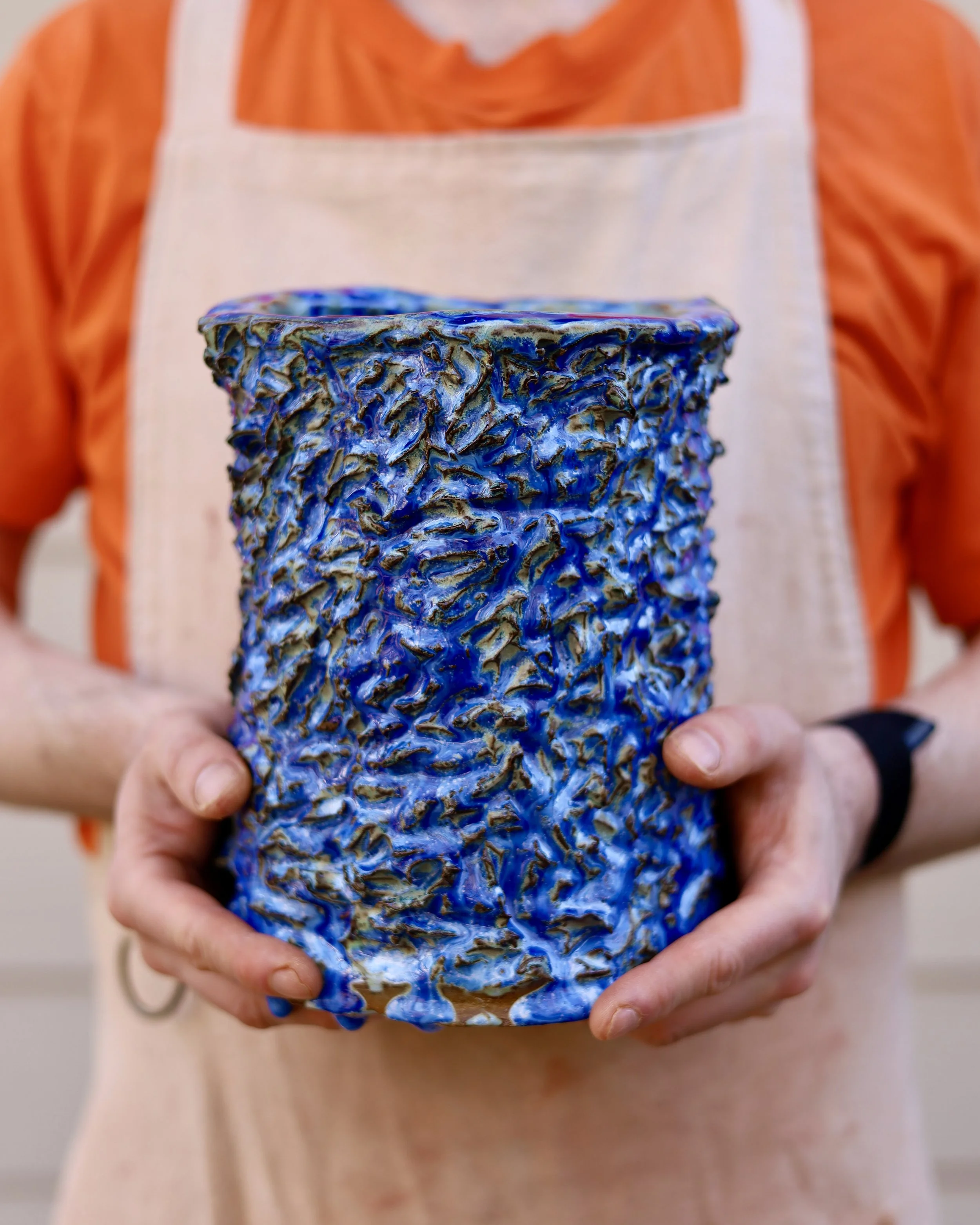 Textured kurinuki-iteration-carved vase in blue/green (available)