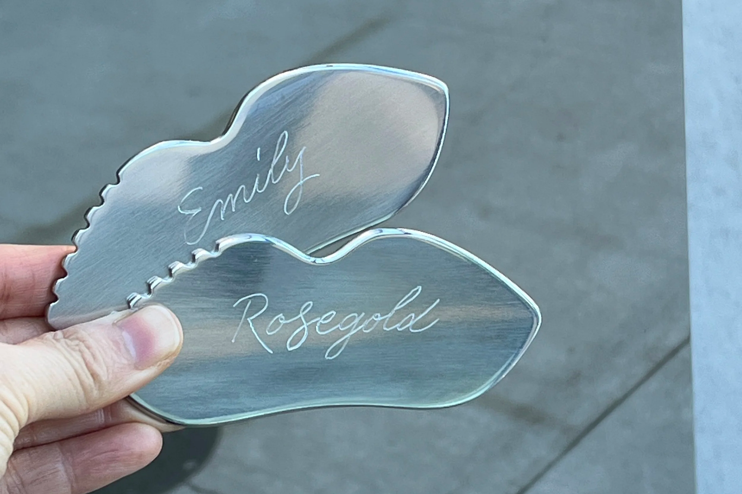Engraving a FaceGym MULTI-SCULPT tool at an on-site beauty brand event in Silver Lake