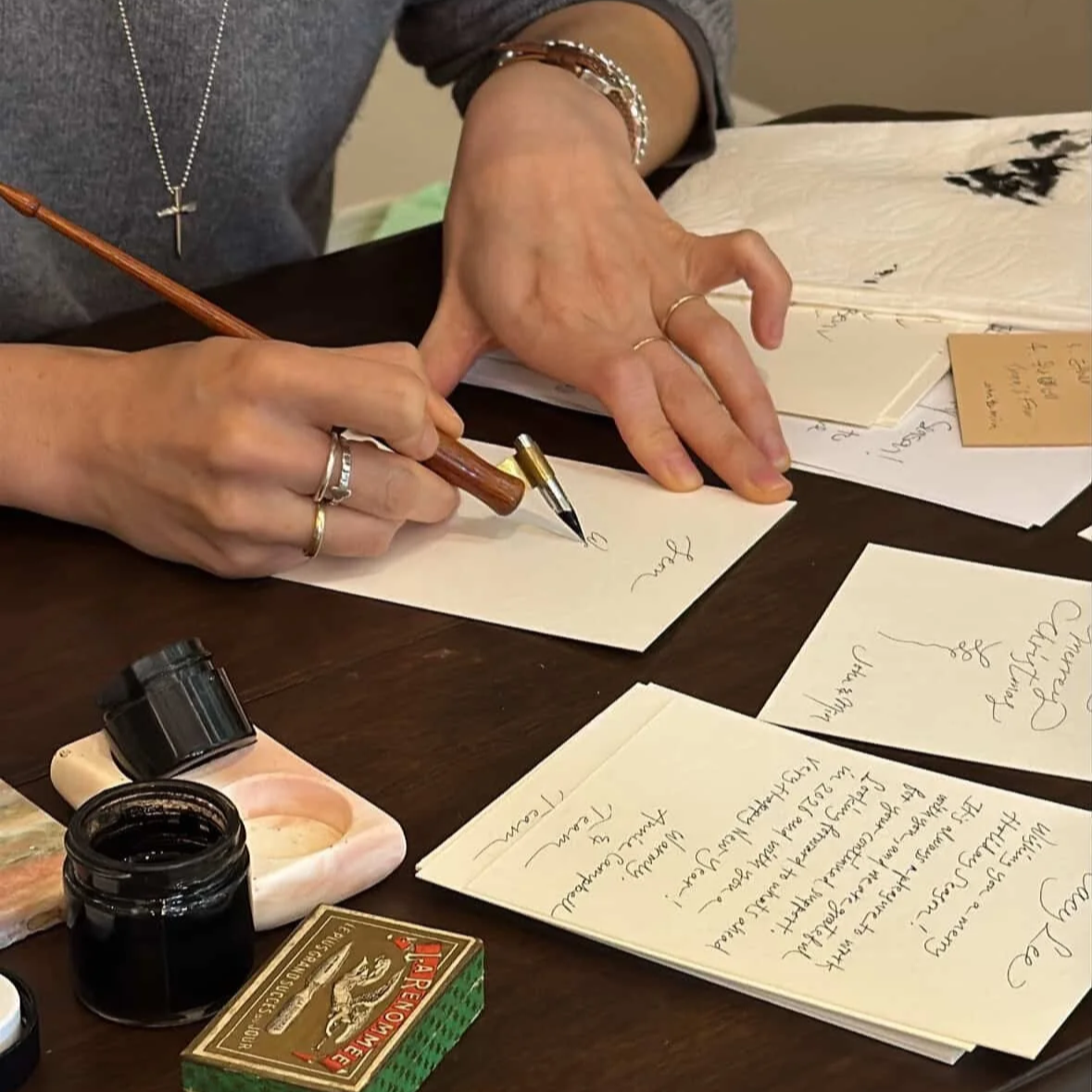 On-site calligraphy for Santa Maria Novella luxury fragrance event in Los Angeles, bespoke event calligrapher and engraver services.