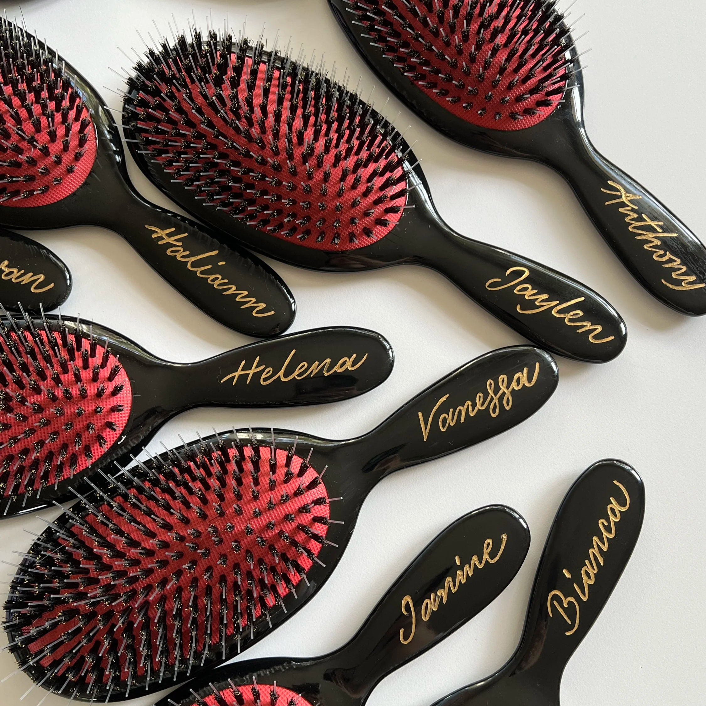 Hot foiling on hair brush at Pravana brand event Los Angeles