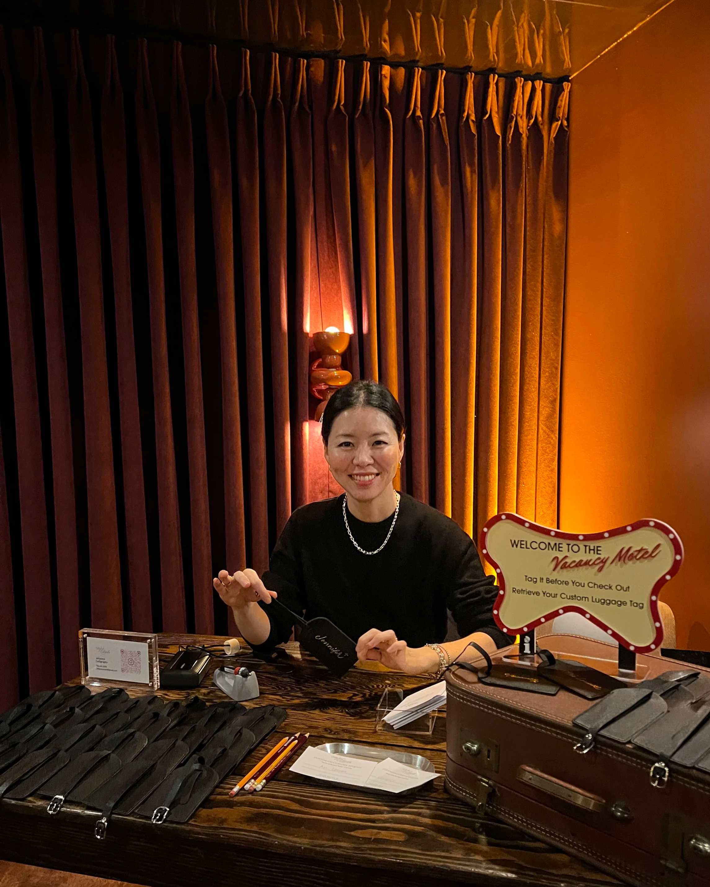 Los Angeles calligrapher Hanseul Kim providing on-site live calligraphy and engraving for luxury brand event