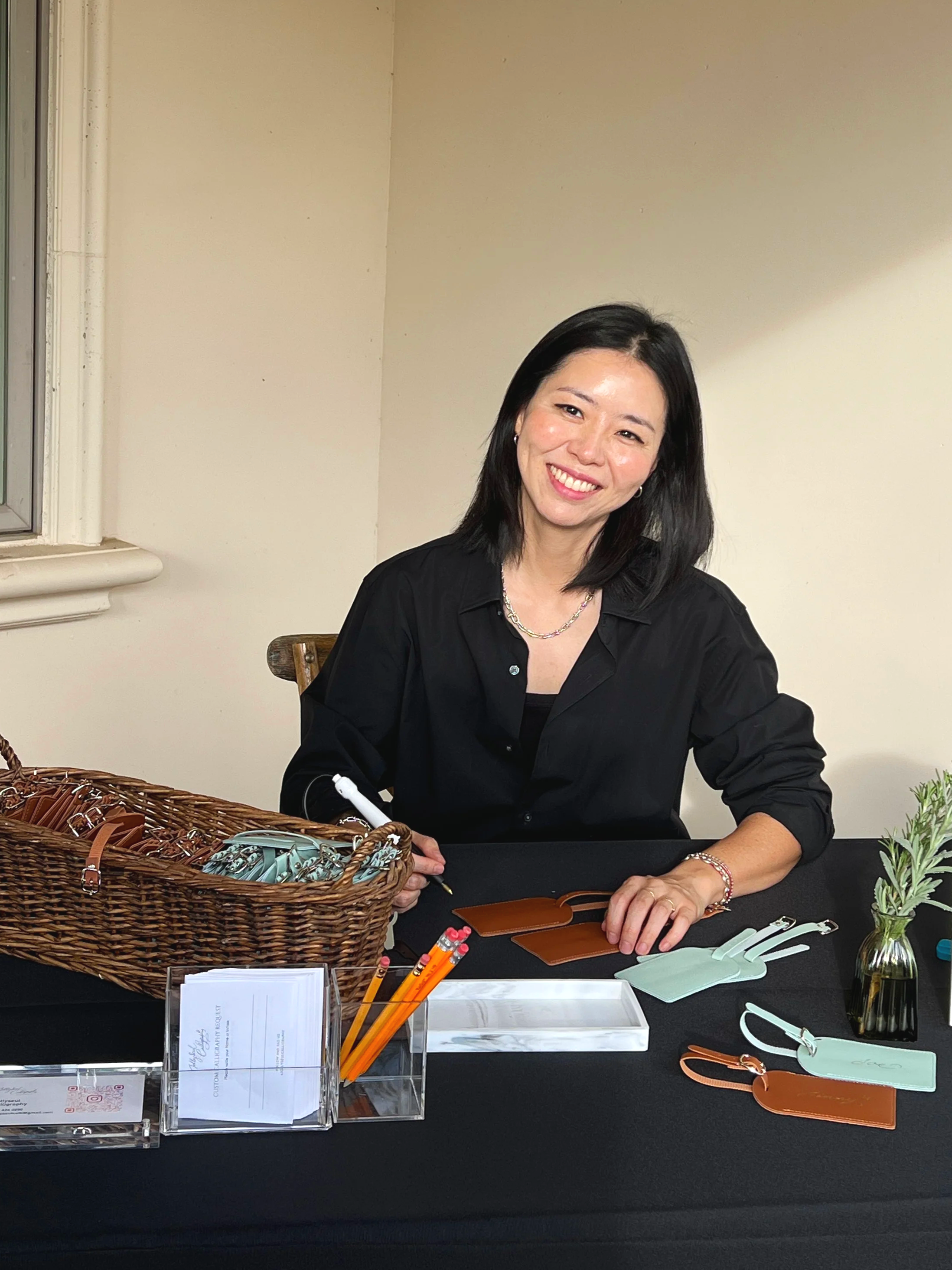 Los Angeles calligrapher Hanseul Kim providing live event calligraphy and on site personalization for luxury brand events.