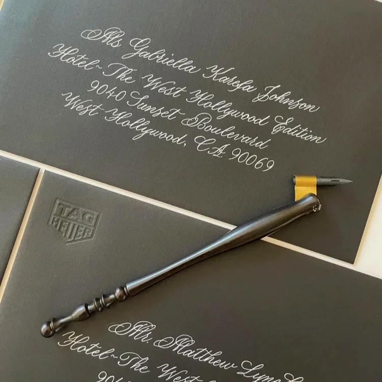 Invitation addressing calligraphy for Tag Heuer luxury event in Los Angeles, professional Los Angeles calligrapher for VIP brand invitations.