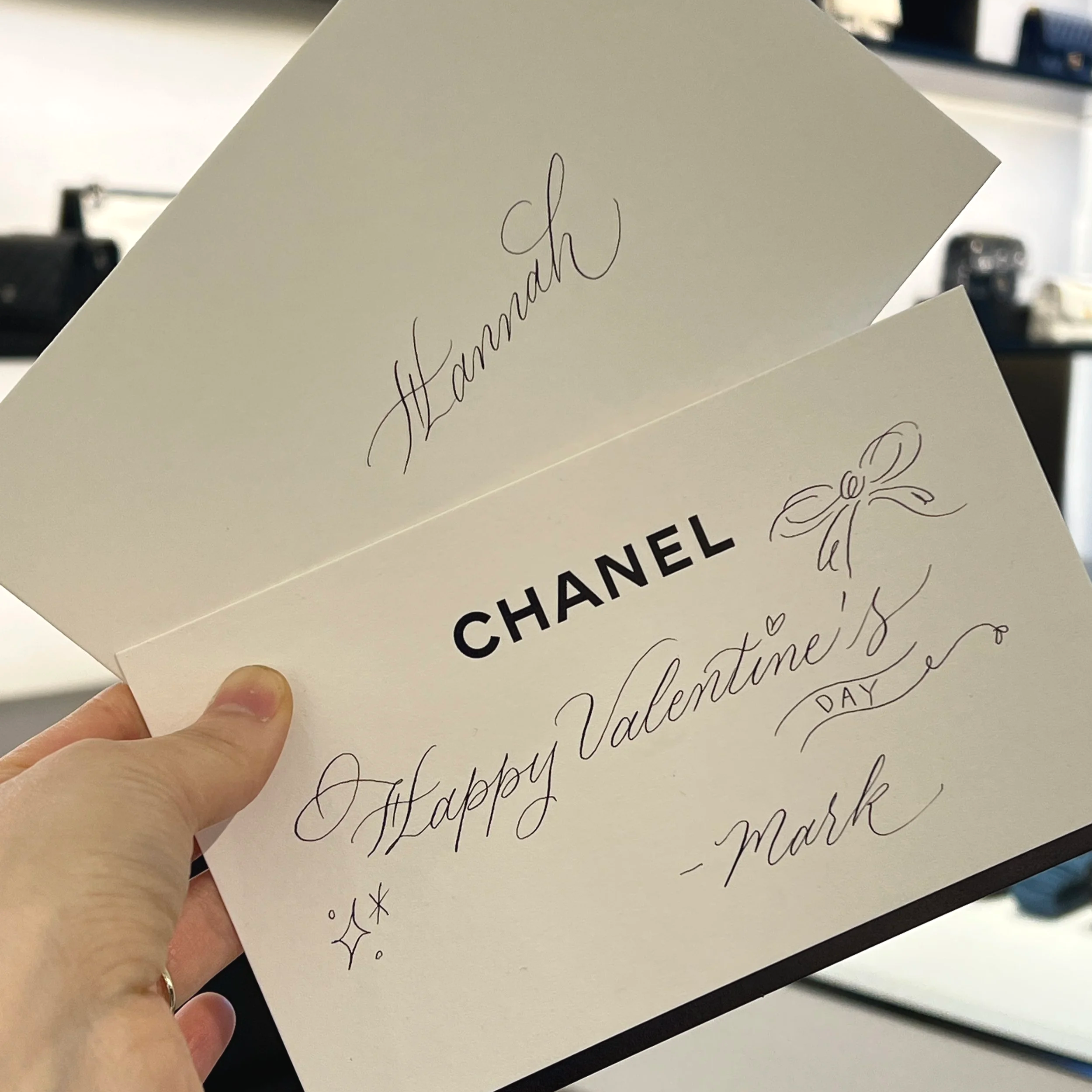 On-site event calligrapher creating custom lettering at luxury brand event in LA