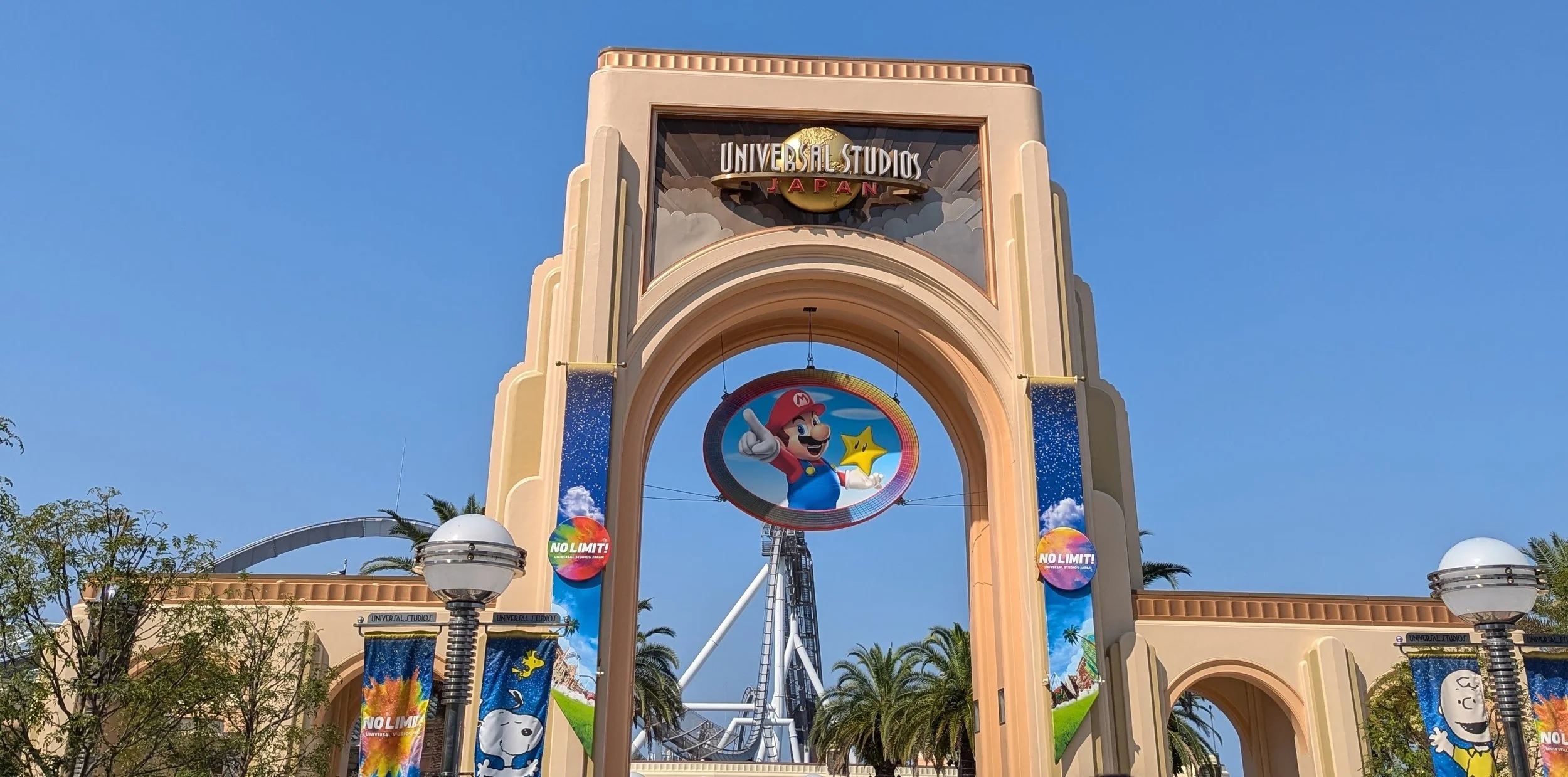 Universal Studios Japan entrance arch with the rotating Universal globe in Osaka