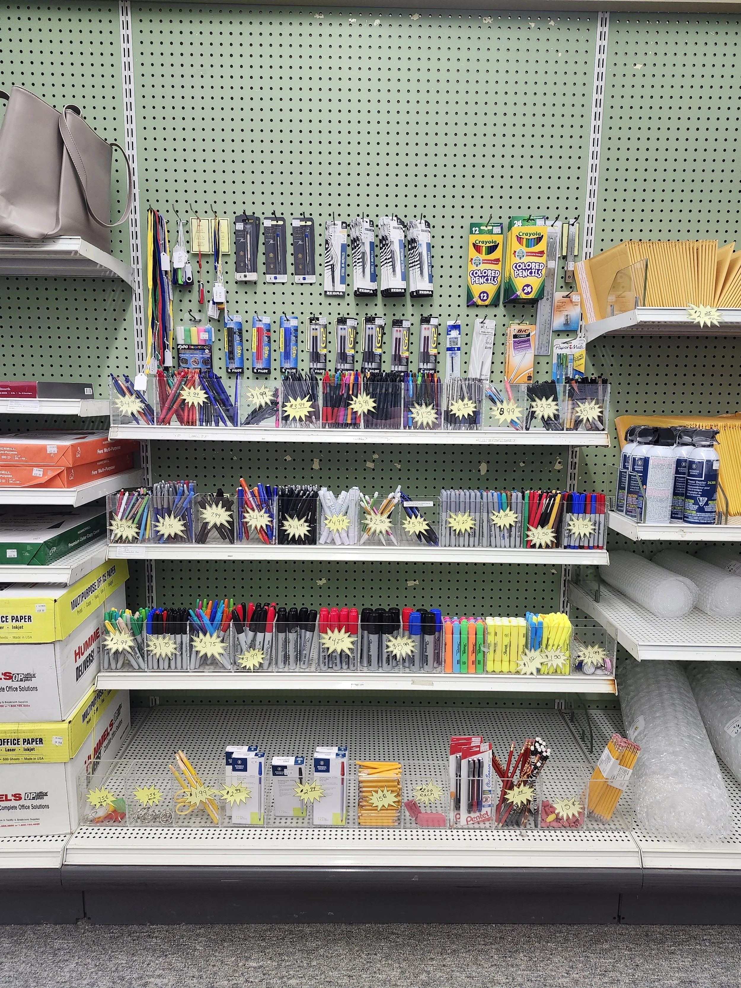 Norwich Copies Plus inventory of pens, markers, and other writing utensils.