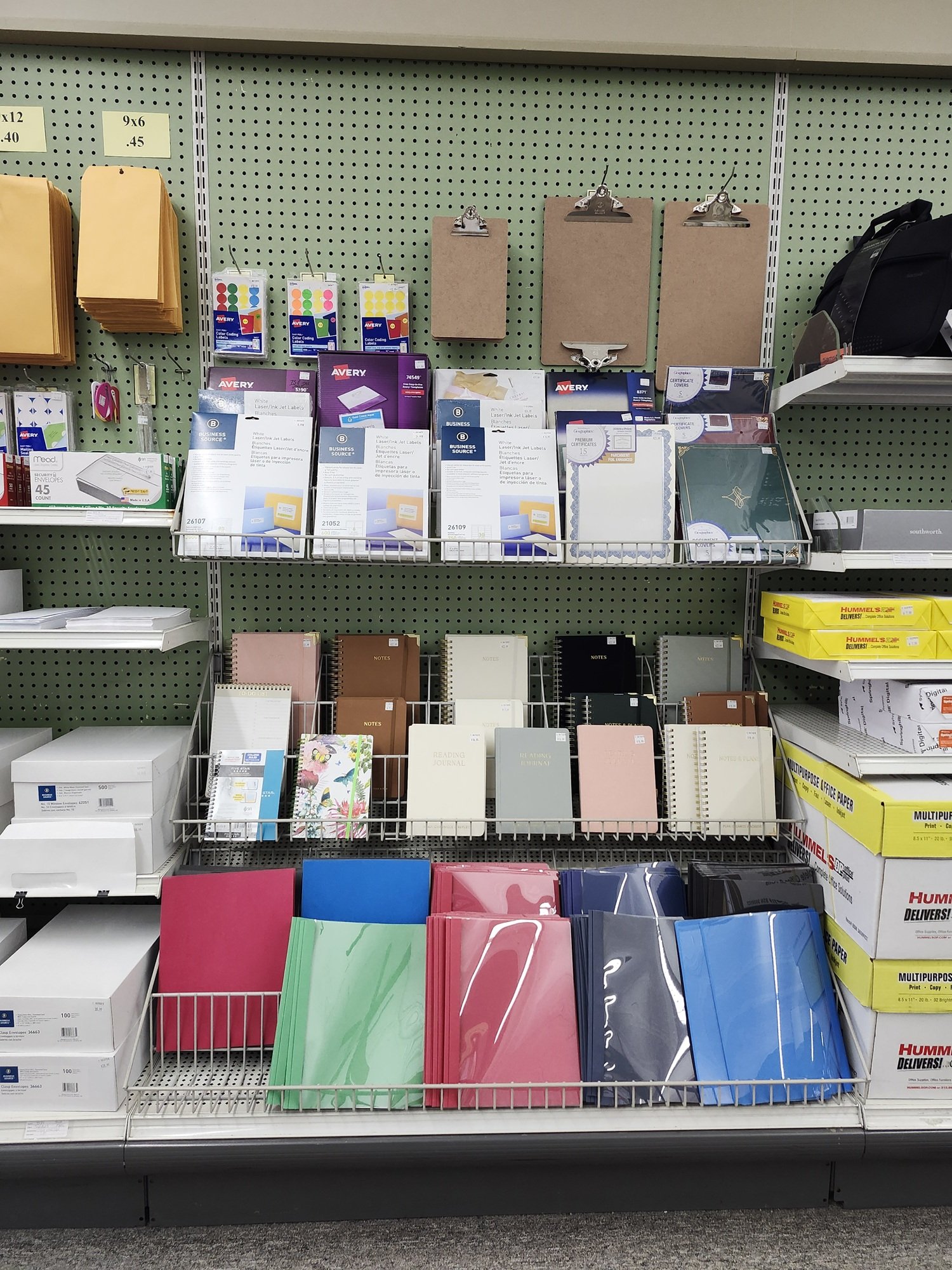 Norwich Copies Plus inventory of labels, notebooks, and report covers.