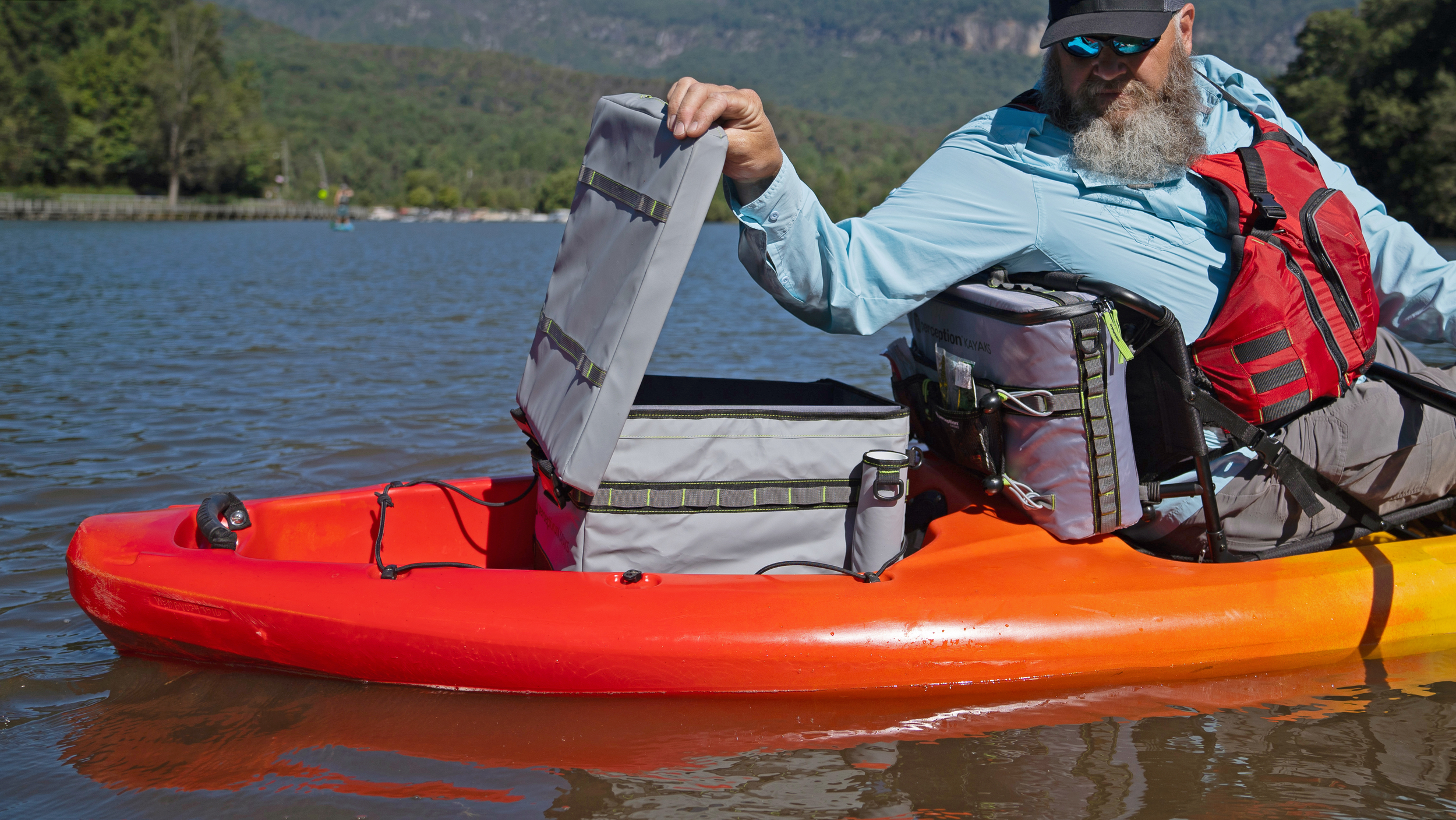 Image of man using Perception Kayak Crate