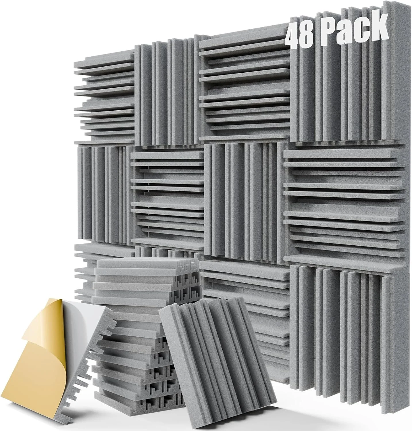 A display of acoustic foam panels in various sizes and shapes, stacked in a neat arrangement, with a few tiles lying in front, primarily in gray 