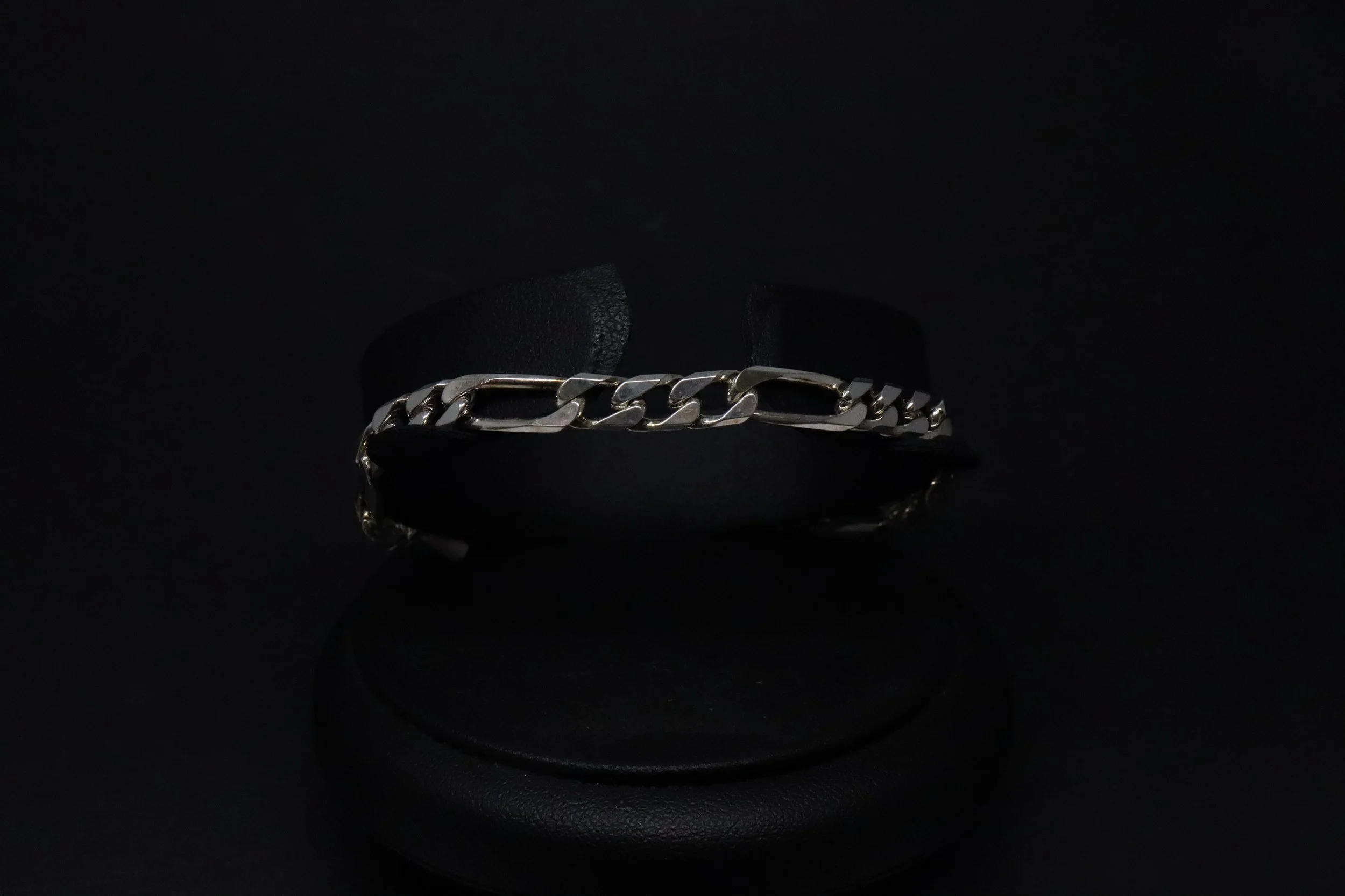 Classic Rhythm: Sterling Silver Figaro Bracelet