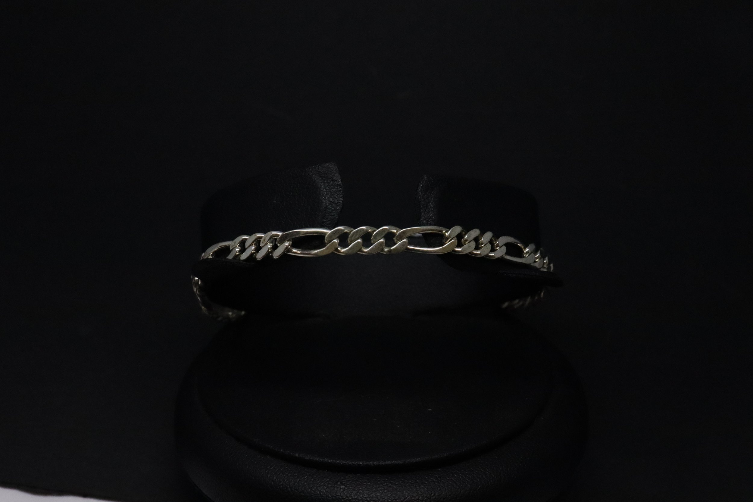 Fine Rhythm: Sterling Silver Fine Figaro Bracelet