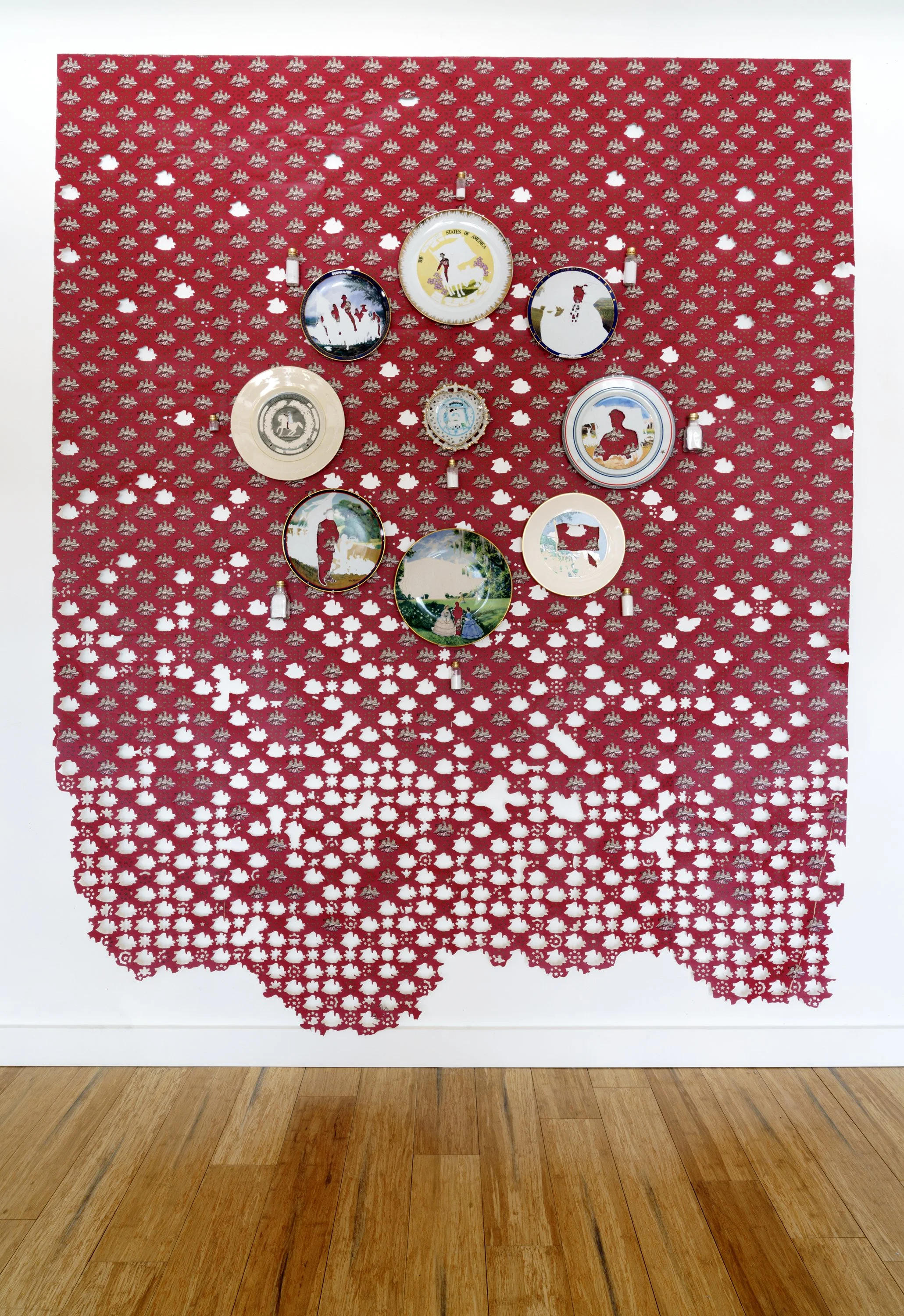 Scenic America | hand cut found wallpaper on mixed media canvas, edited confederate commemorative plates, with dust, glass, cork, gold leaf, and brass | 72 x 88 x 3" | 2026