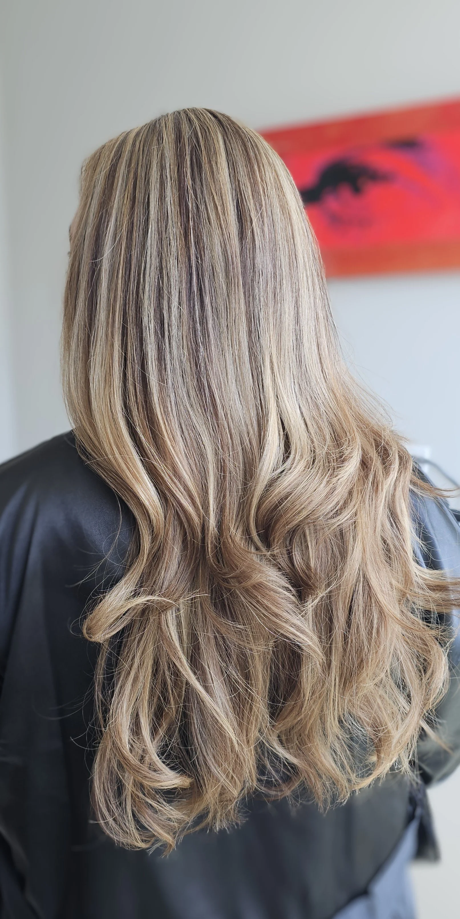 Client with blonde curled hair