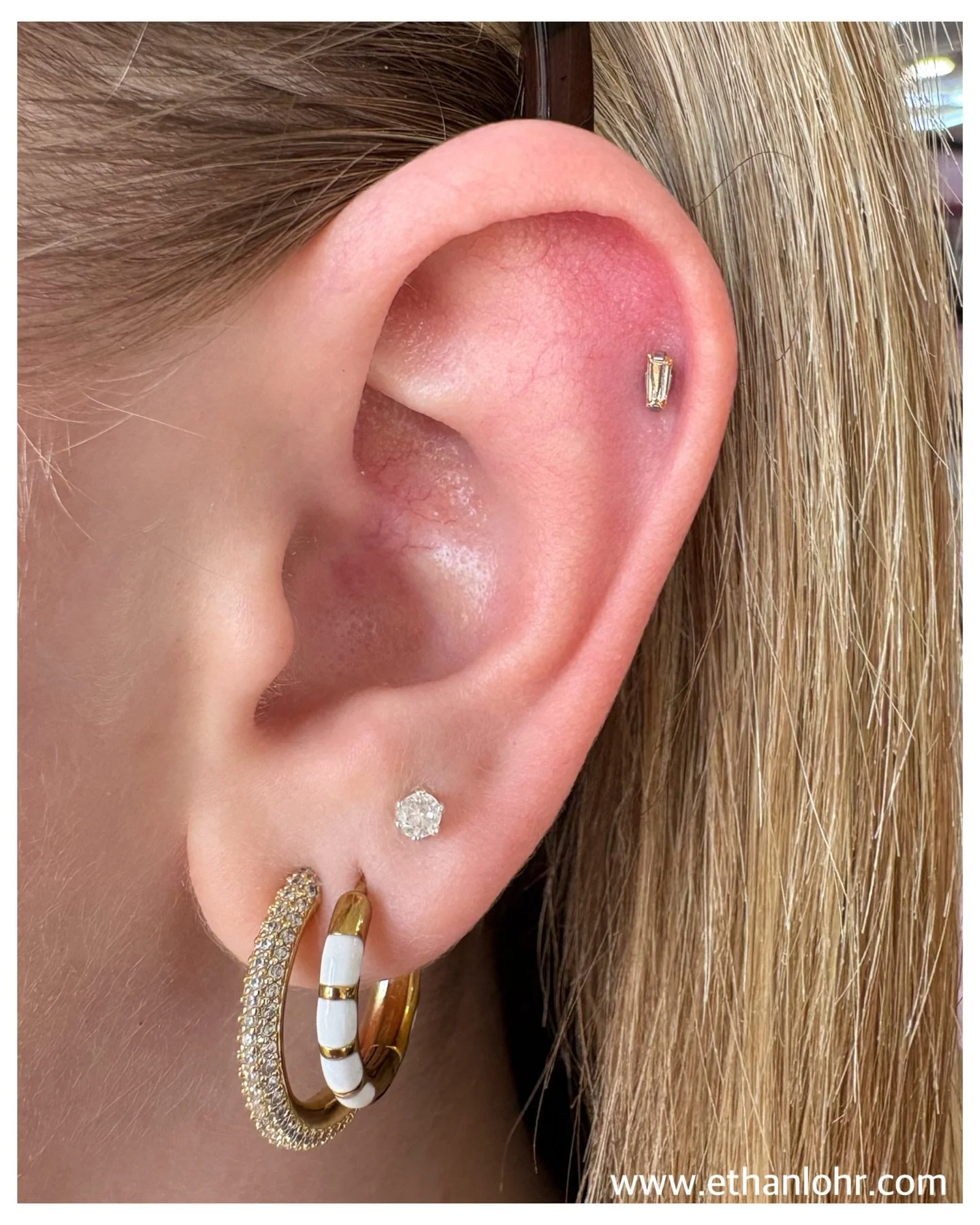 Sometimes simplicity is enough. Here&rsquo;s a cute champagne colored baguette we installed in a fresh helix piercing. Thanks for viewing. Book with me at https://www.nomasterstattoo.com