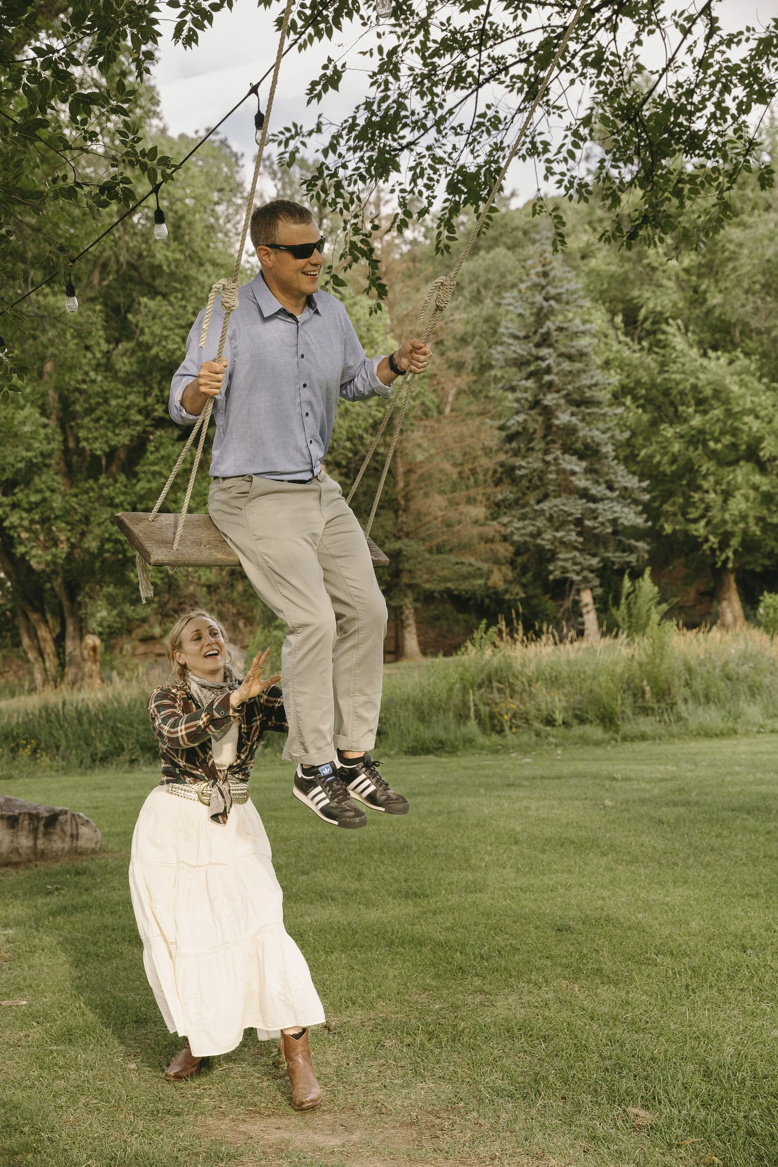 adults swinging
