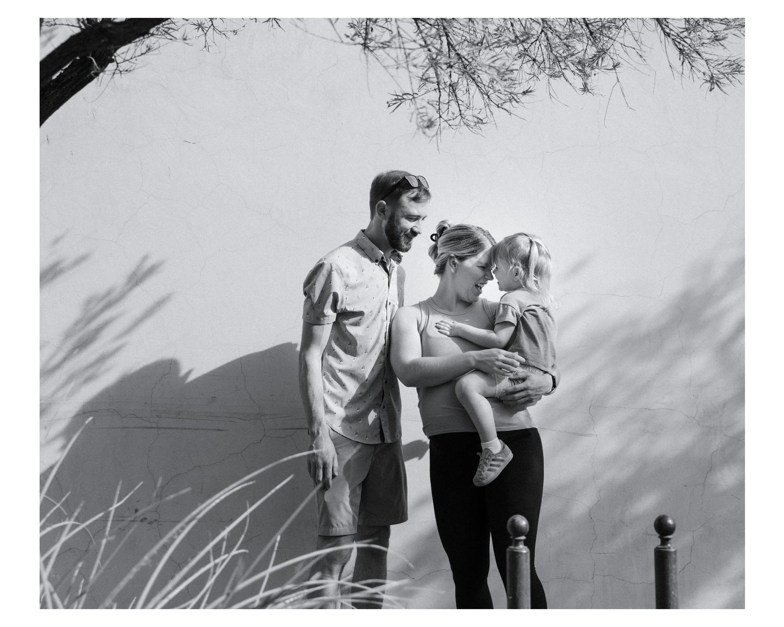 family stops for a quick photo during a documentary family photo session in tucson