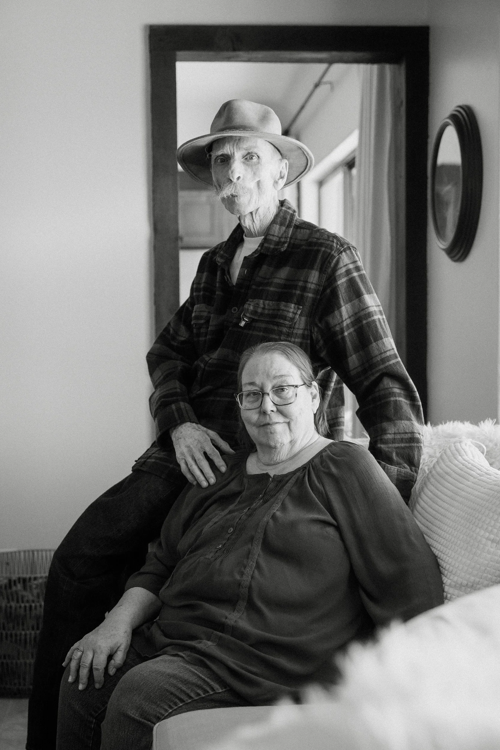  grammy and grandpa sit for a portrait in tucson arizona 