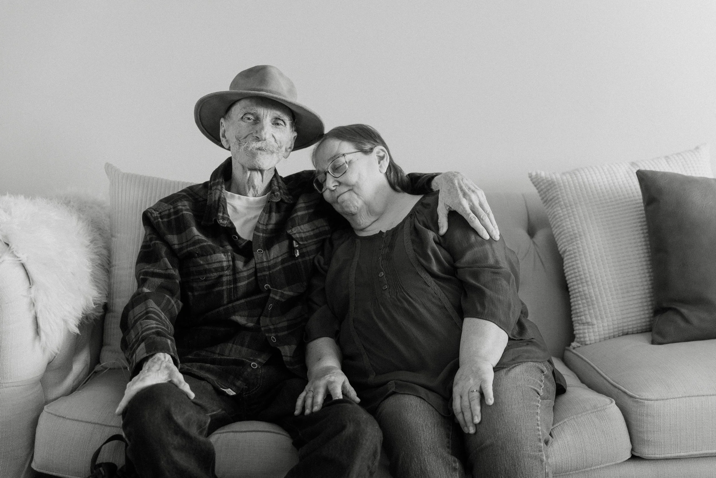  grammy and grandpa sit for a portrait in tucson arizona 