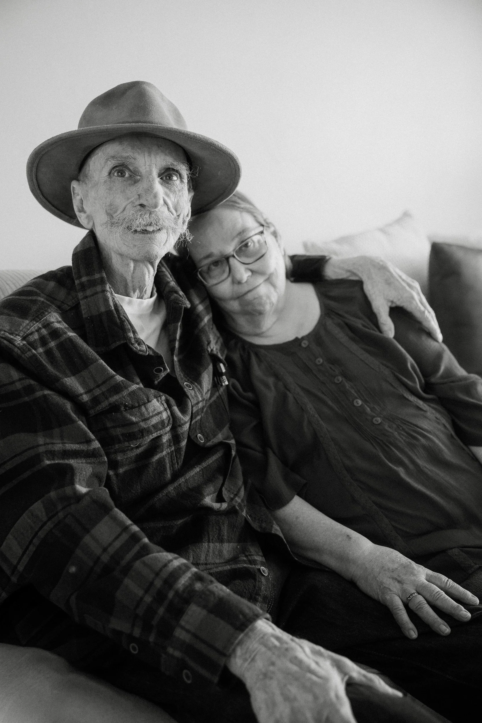  grammy and grandpa sit for a portrait in tucson arizona 