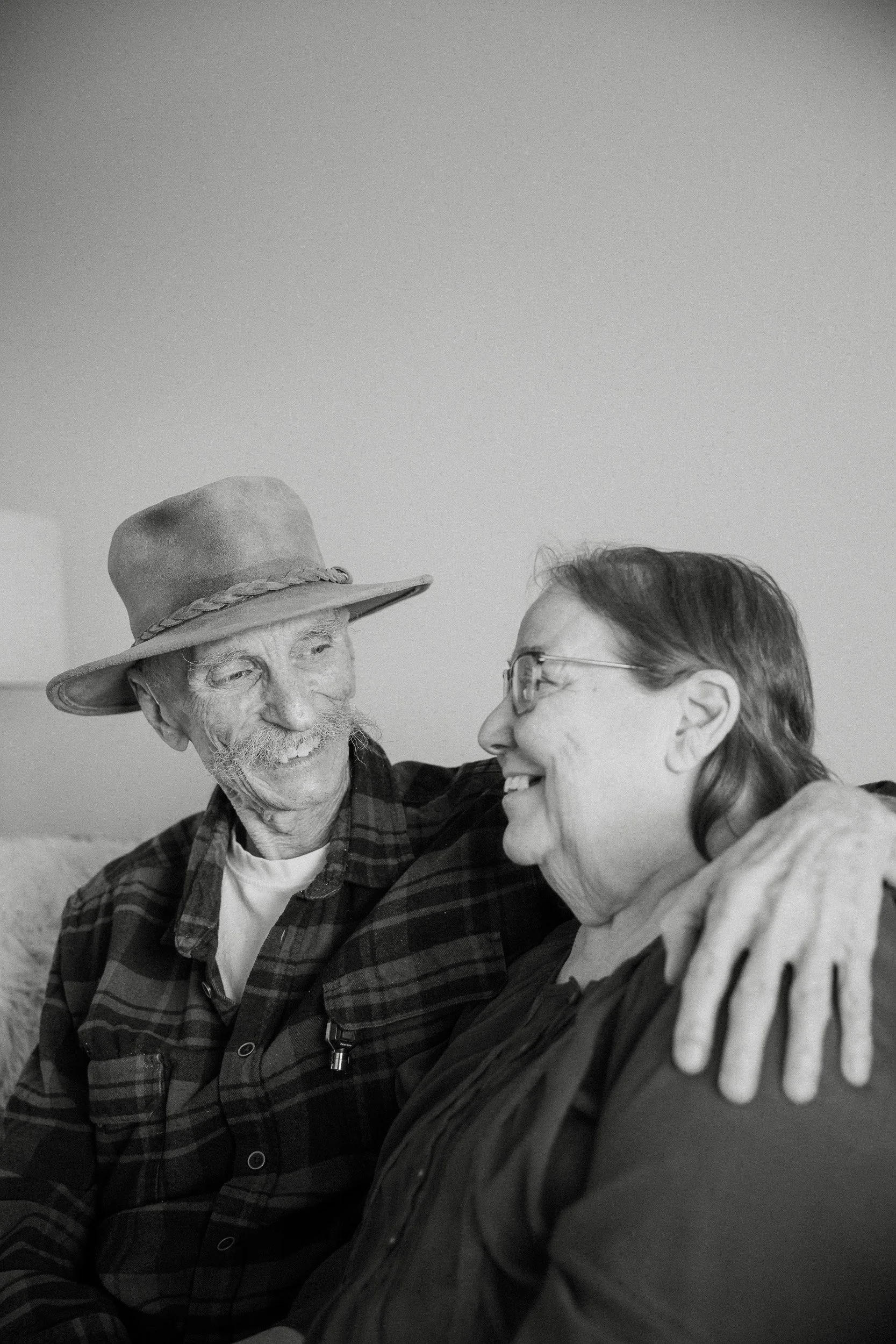  grammy and grandpa sit for a portrait in tucson arizona 