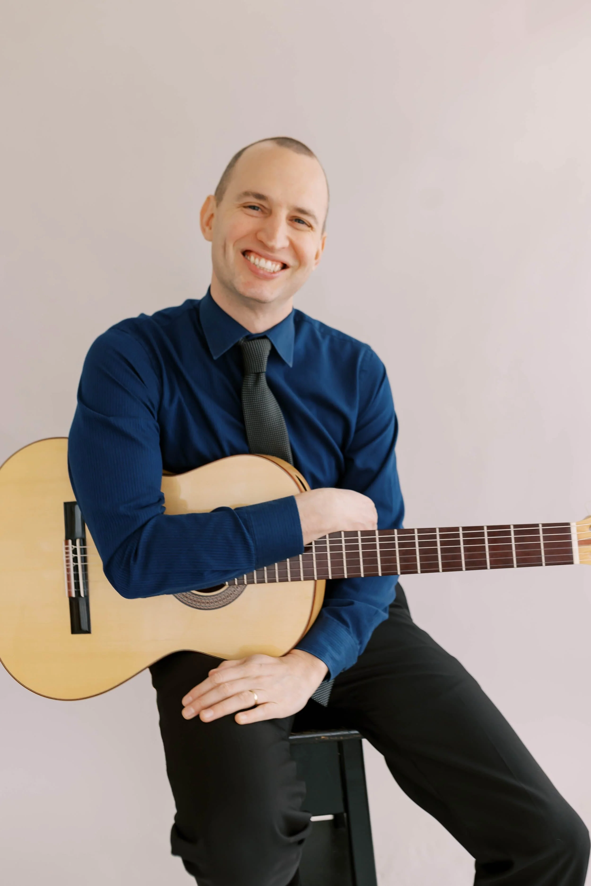 Jim Perona connecting with an intimate audience at a house concert