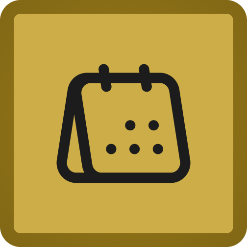 Group of professionals networking and conversing at an indoor event, with warm lighting and modern decor in the background.