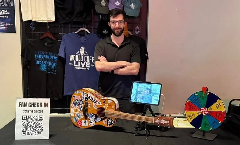 The start of the ultimate artist street team! We had a spinning wheel, a sizzle reel on replay on an iPad, trivia, and the artist’s beach guitar that fans had the opportunity to play, and a chance to win a signed shirt.
First trial run was a s