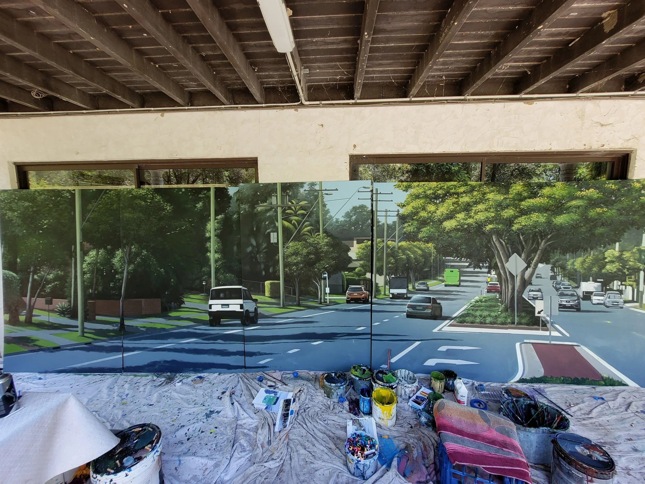 Close up of a painting looking up Chatswood road towards Daisy Hill, a suburb to the south of Brisbane.