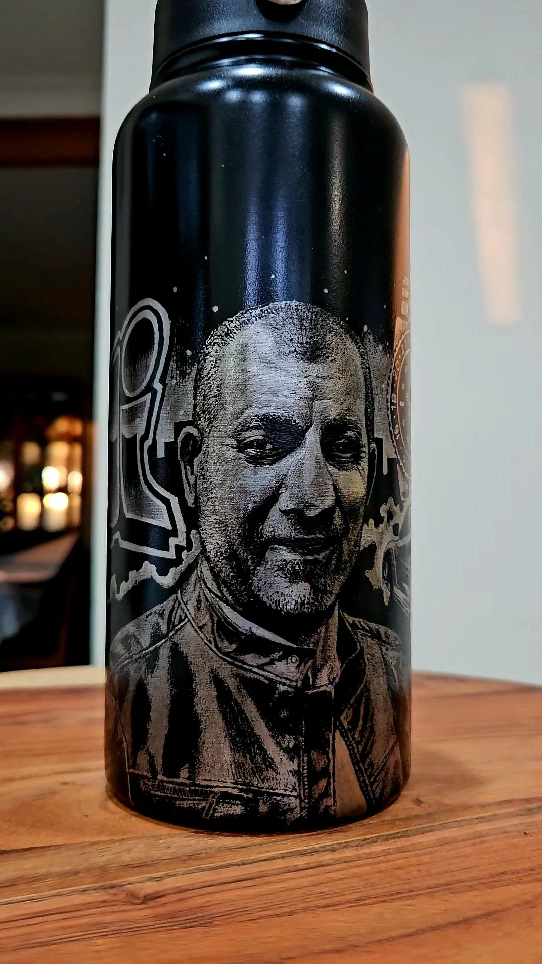 portrait on drink bottle