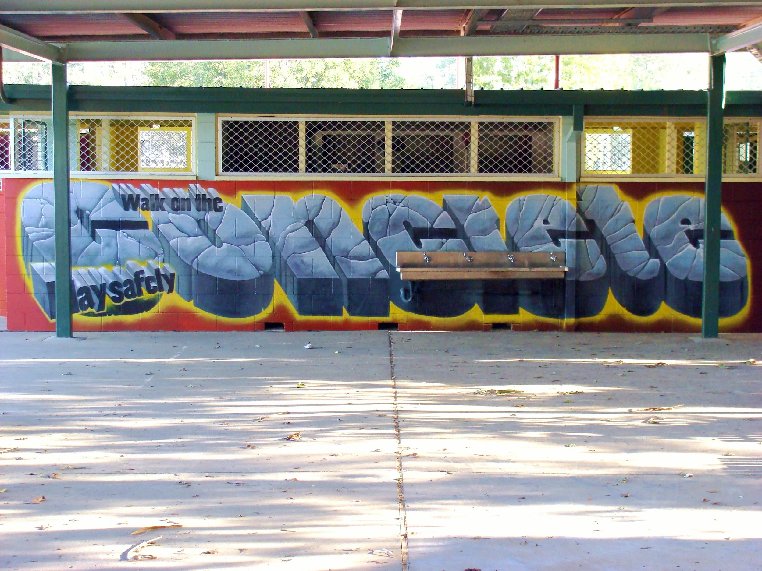 "Walk on the concrete" mural at Kingston Primary School