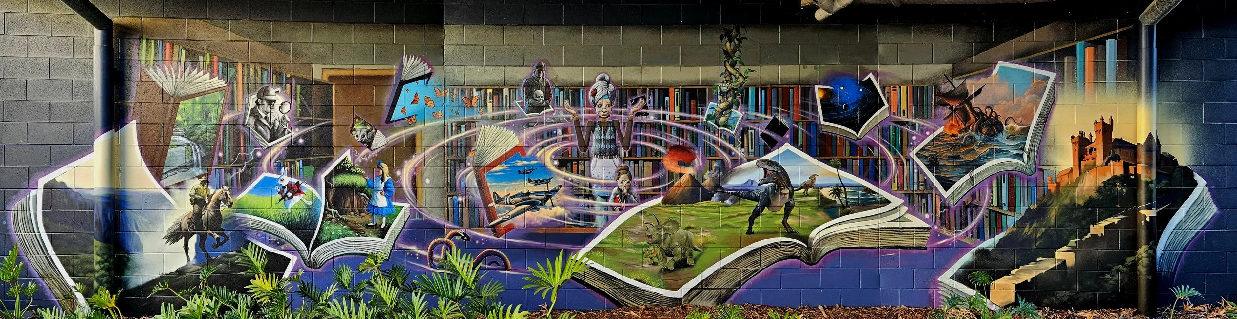 Mystical Library scene painted on the pathway leading from the to entrance of the Browns Plains Library to a park in behind the building.
(Painted with Paul Turnbull.)