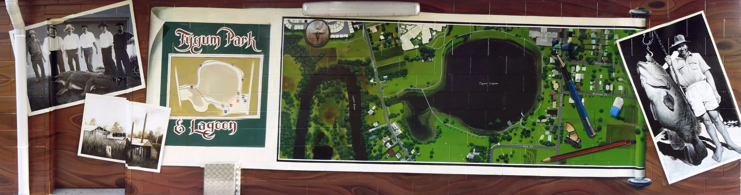 The second of 2 murals depicting a map and historical photos of the area at Tygum Lagoon, to the south of Brisbane. (Painted to replace the first one.)