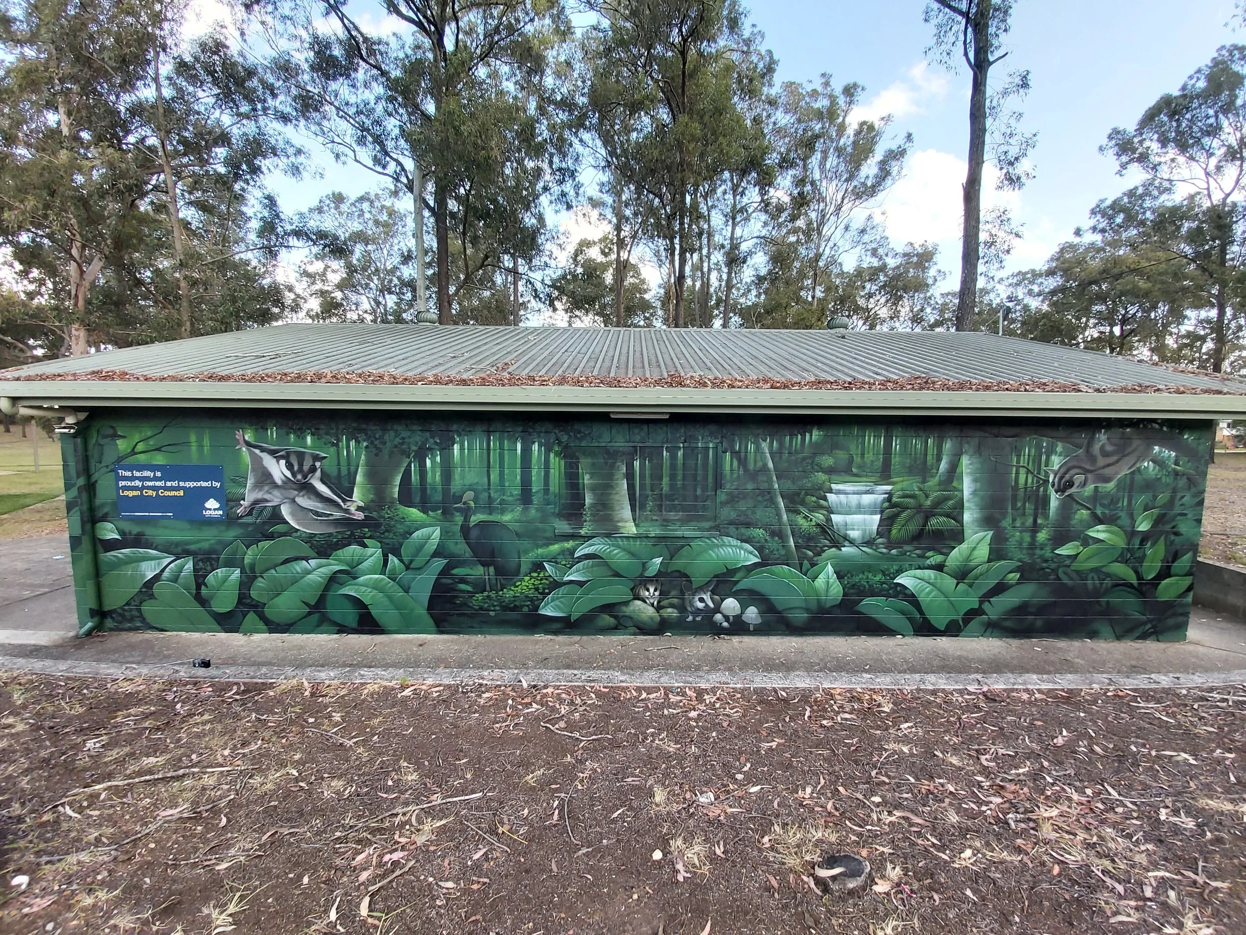 Rainforest scene painted with native animals at a park in Kingston to the south of Brisbane.